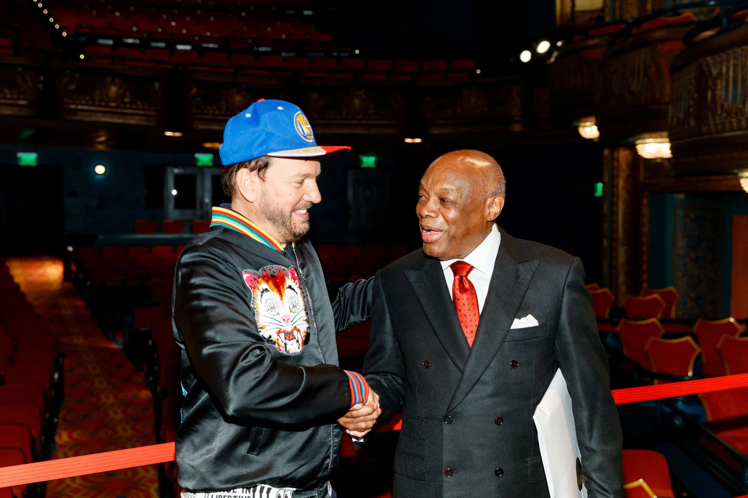 DESIGNER JOHNSON HARTIG ACCEPTING A PROCLAMATION FROM MAYOR WILLIE BROWN