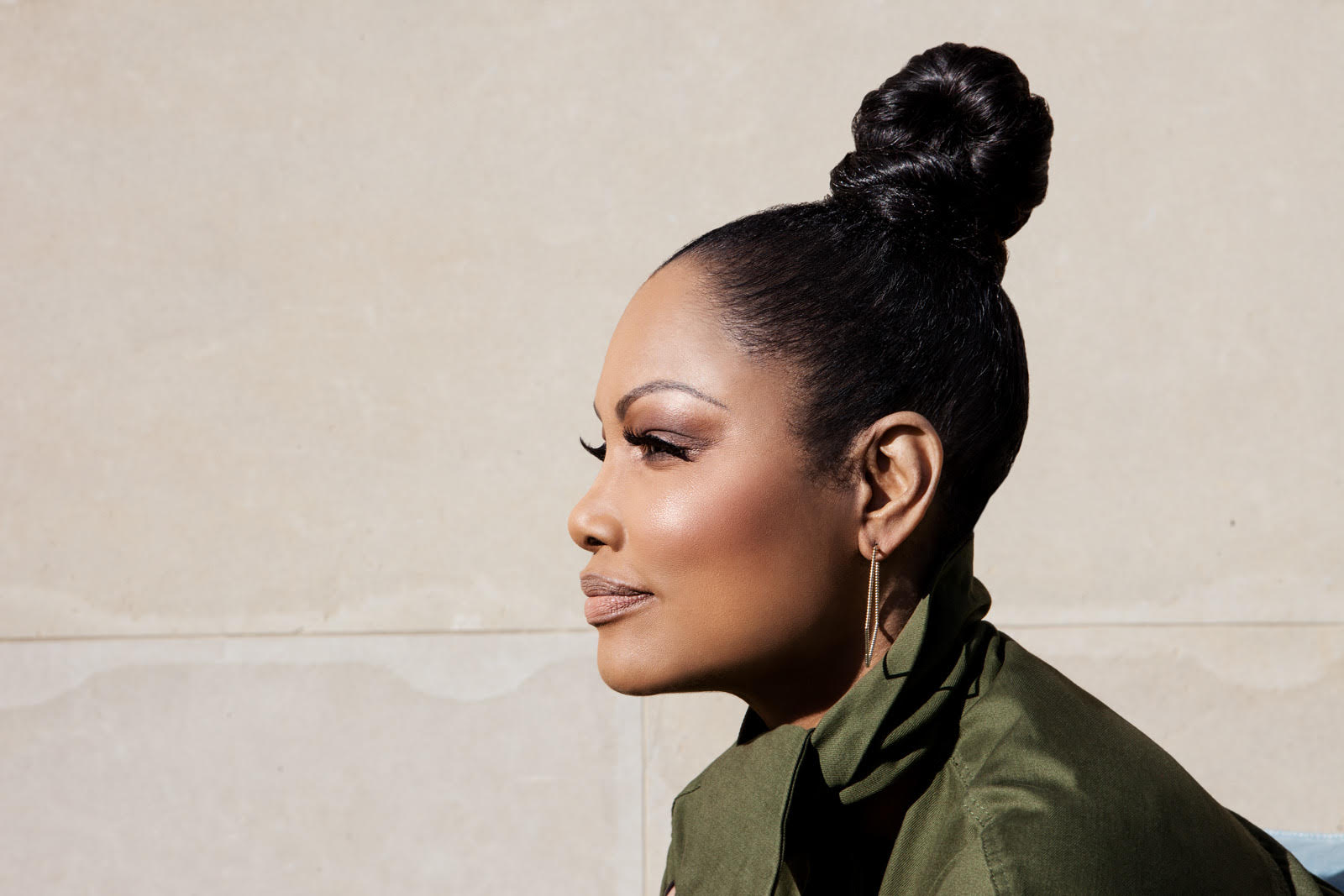 on Garcelle top Mango , earrings Lola Fenhirst