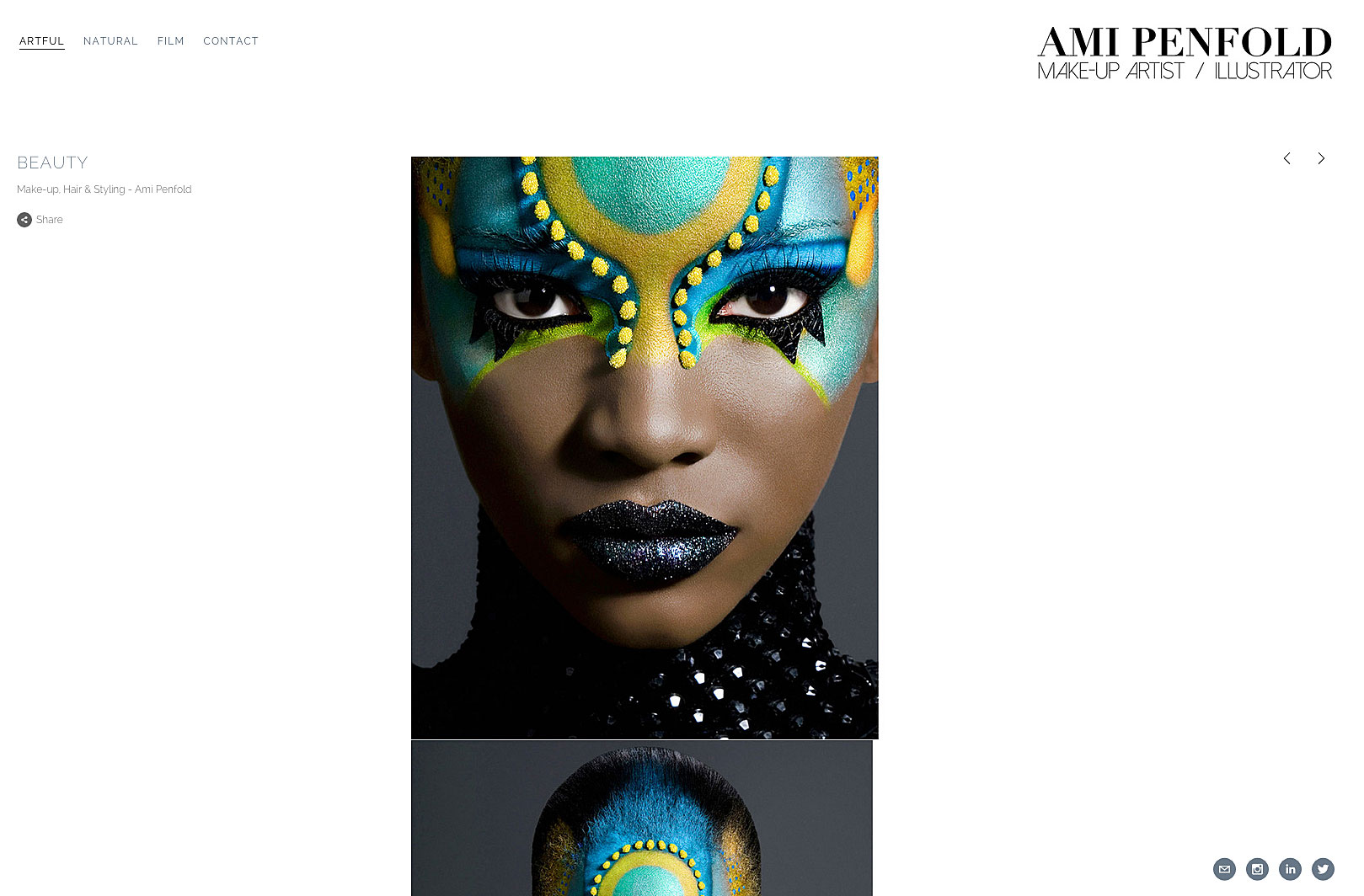 african model with ornate turquoise and blue make-up design