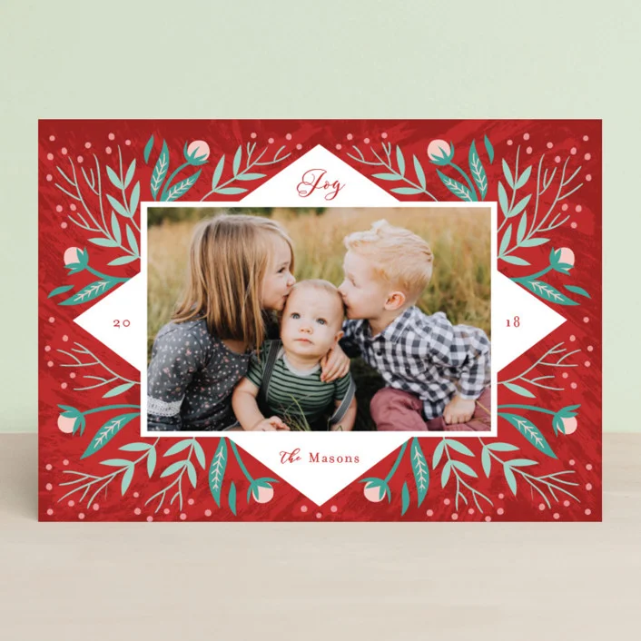 Sprigs of leaf and flower bud graphics and a unique diamond photo frame give this illustrated card a one-of-a-kind feeling. Periwinkle by Rebecca Daublin