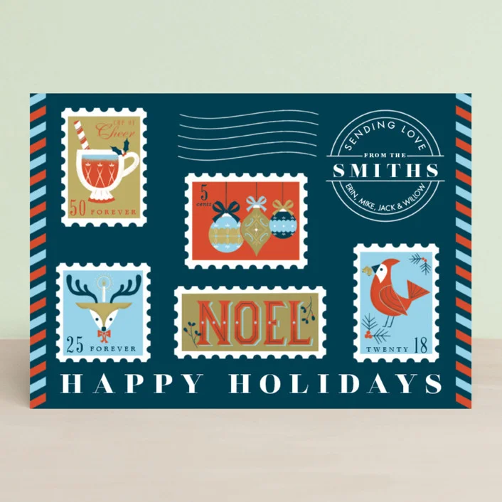 Like an airmail envelope, this design has all the charm of the vintage postage stamps. Sending Holiday Spirit by Green Hound Press