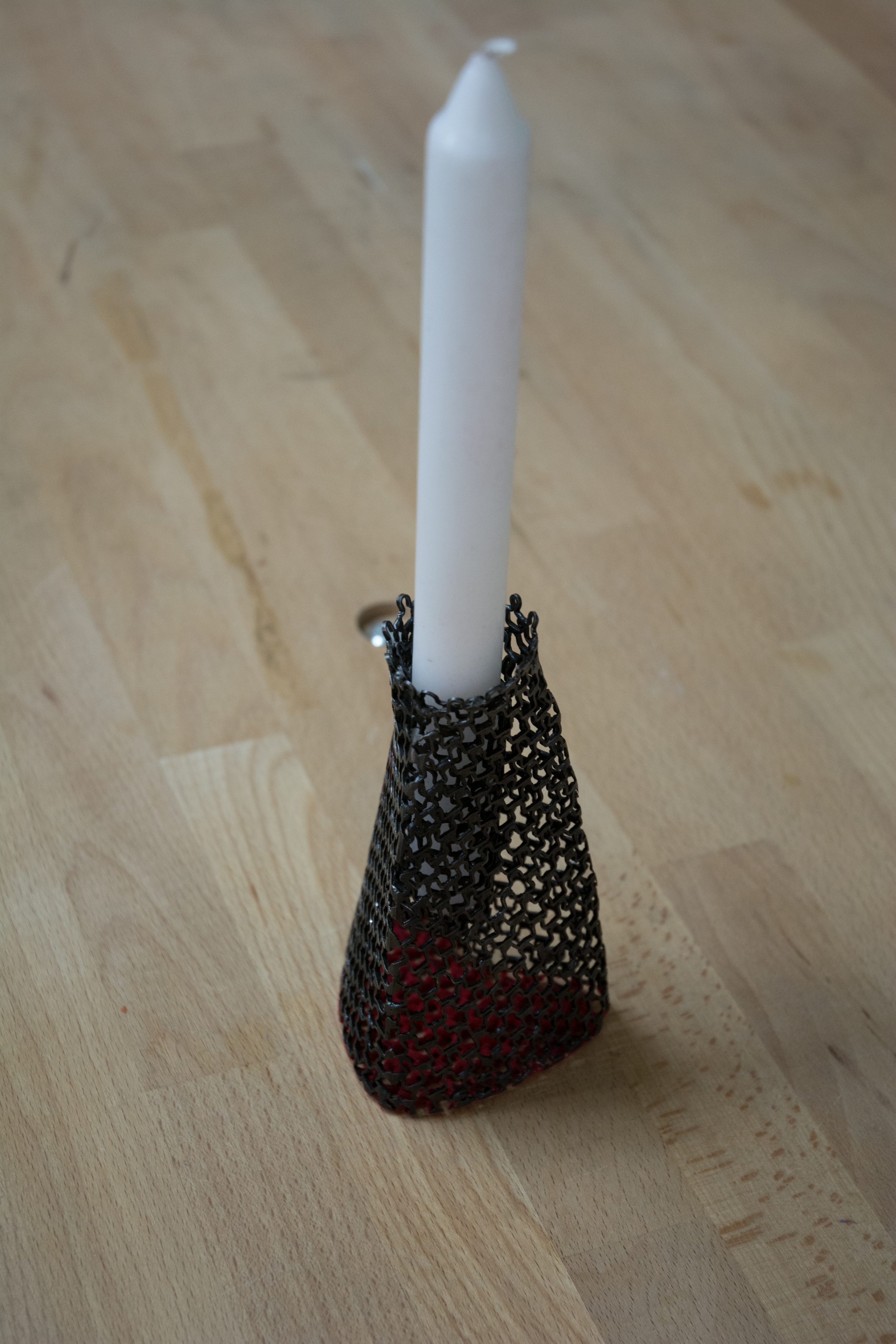 Sarah Holden – Mild steel, velvet flocking hand bent, hammered and welded steel wire $125 