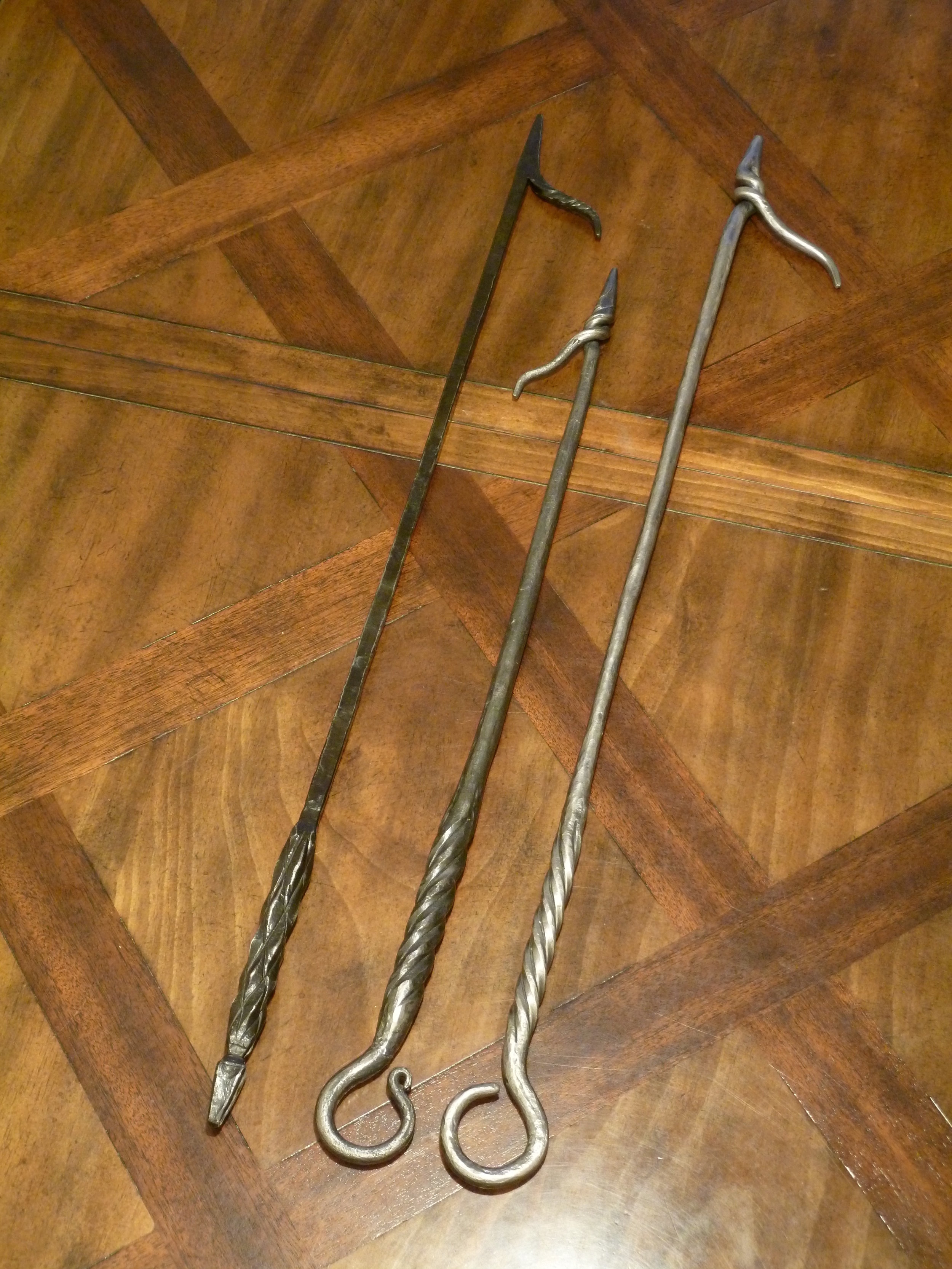 Firepokers on table by Brian Blankstein