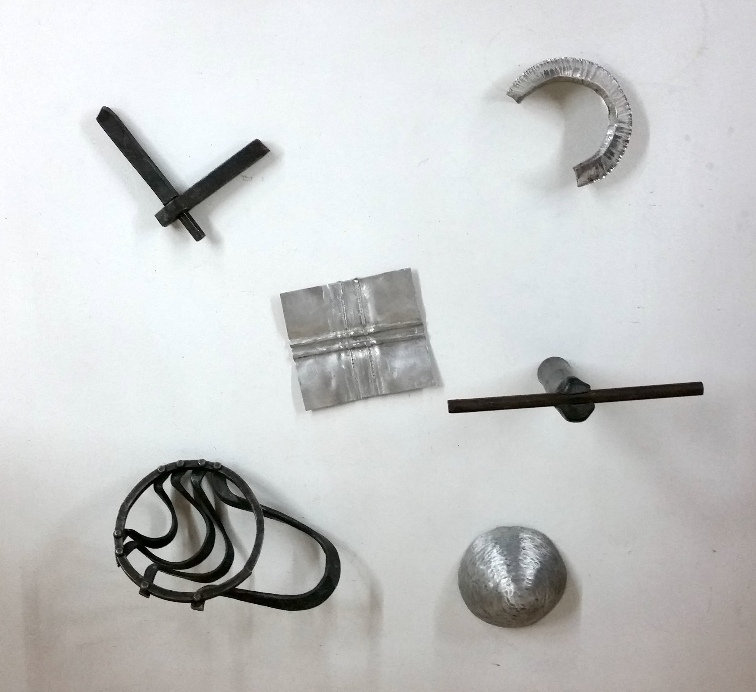 Sarah Holden, Teaching Samples: Rivets, Mortise and Tenon, Alternate Connection, Foldforming, and Angle Raising , Aluminum and mild steel