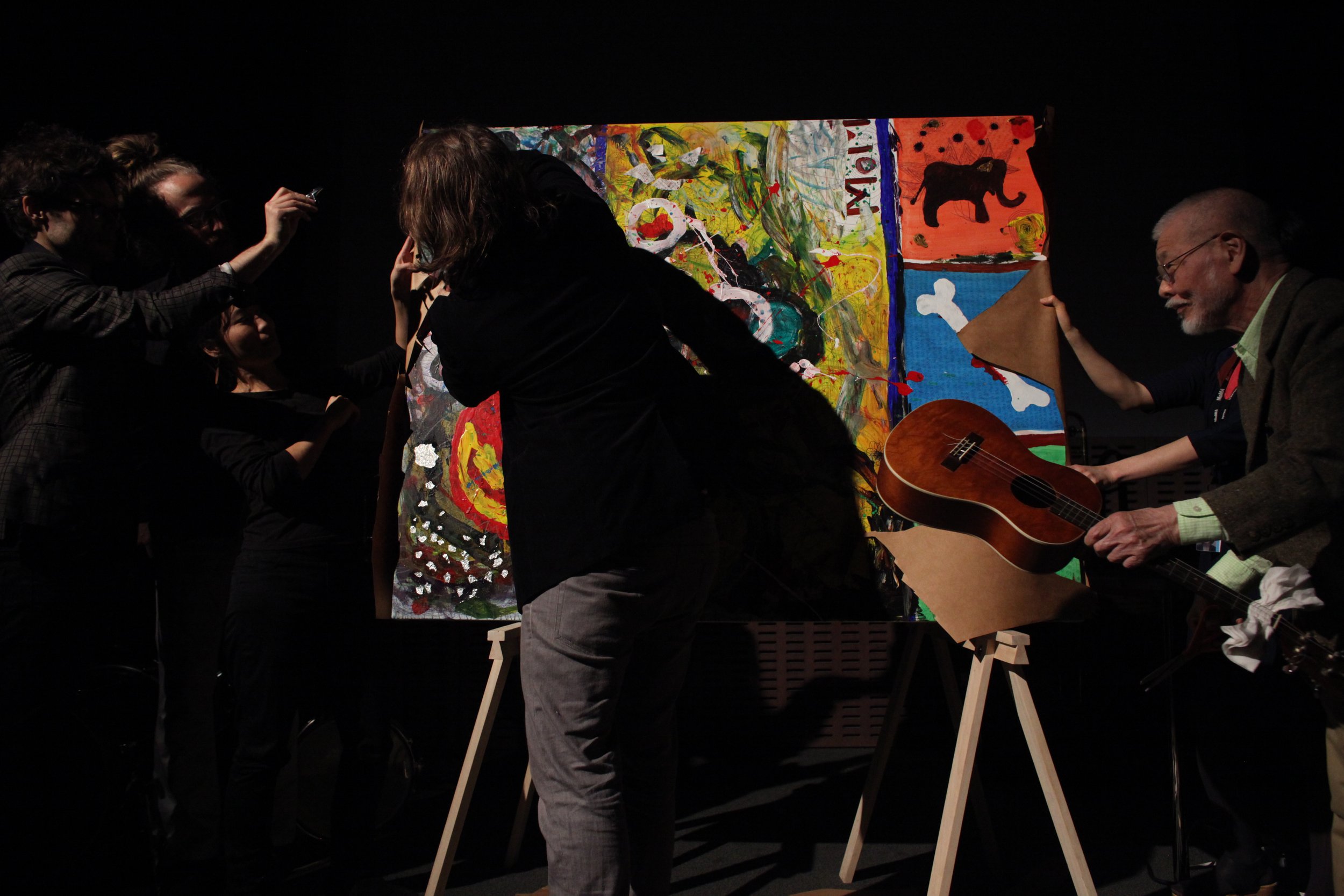  Performance of Yasunao Tone’s  Music for a Painting  (1962) in 2012 at MoMA, New York. Performed by Yasunao Tone, Sam Kulik, Matt Mottel, Lary 7, Miki Kaneda, and Ann Adachi, 2012. 
