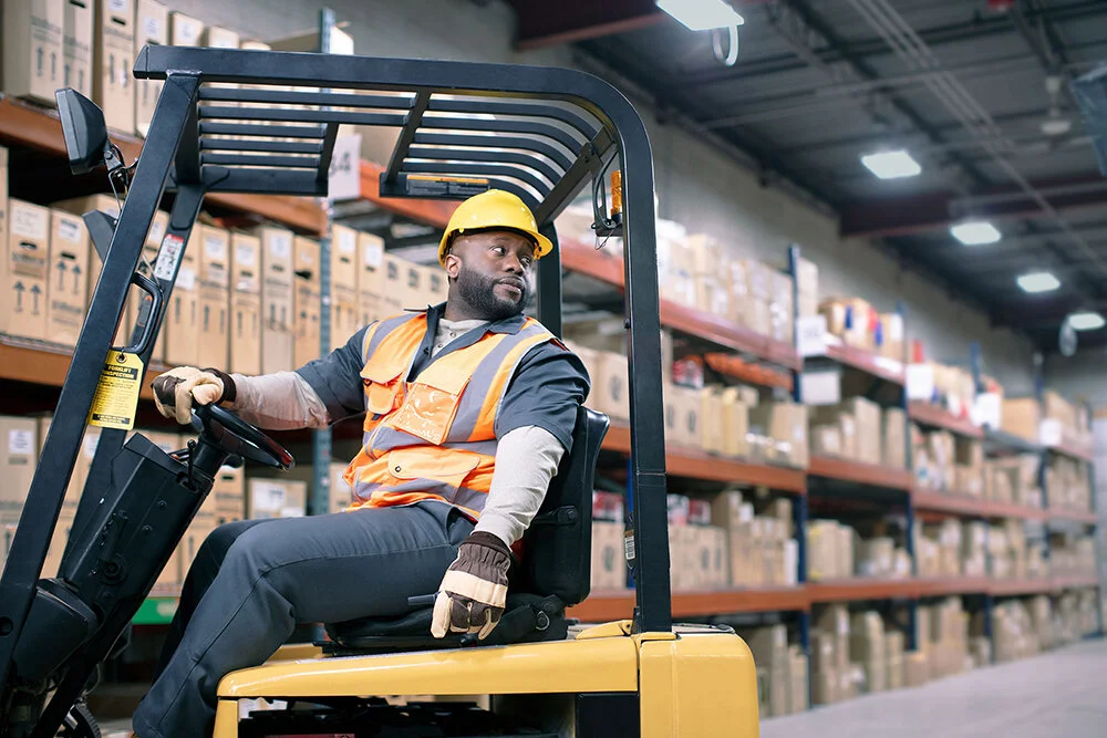 B2BMC_Blue_Collar_Man_Forklift_Horizontal.jpg