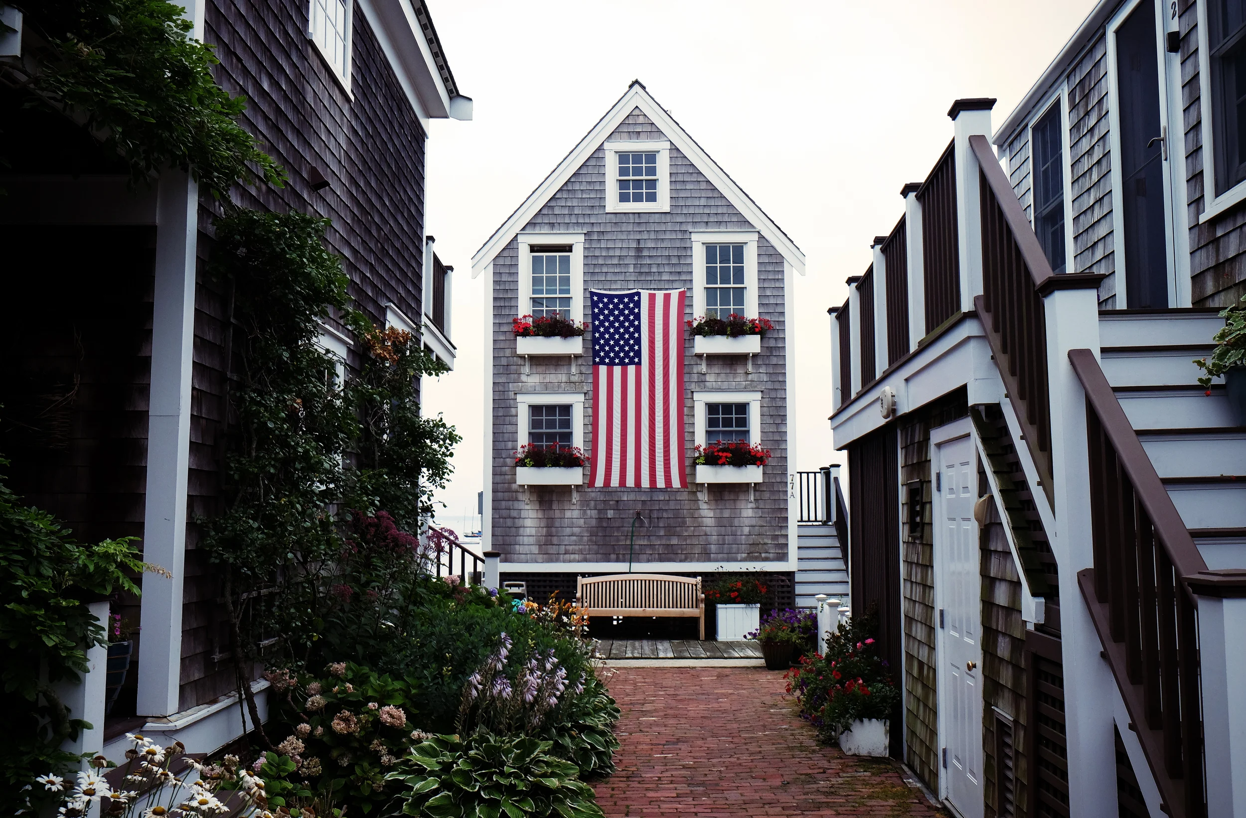 bench-flowers-house-courtyard.jpg