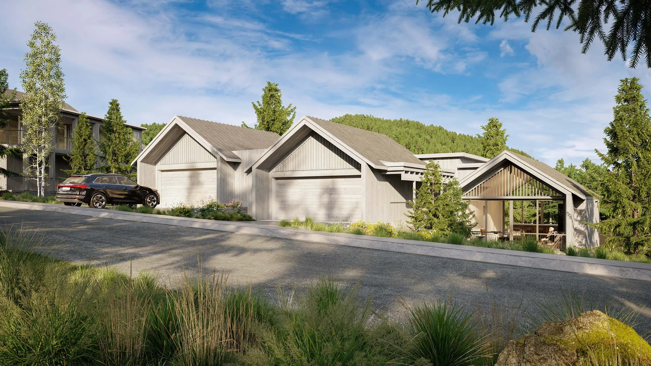 Nature-inspired townhomes using extremely low energy viewed in the summer. Notice the natural materials melting into the mountain landscape.