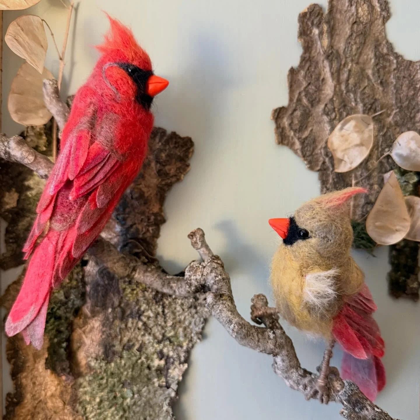Seriously amazing artwork here by Elizabeth - from anatomy and modeling to coloring, hand sculpted and painted beak to meticulously wire-wrapped feet, and pressed and cut individual feathers - in a complete diorama nature scene complete with painted 