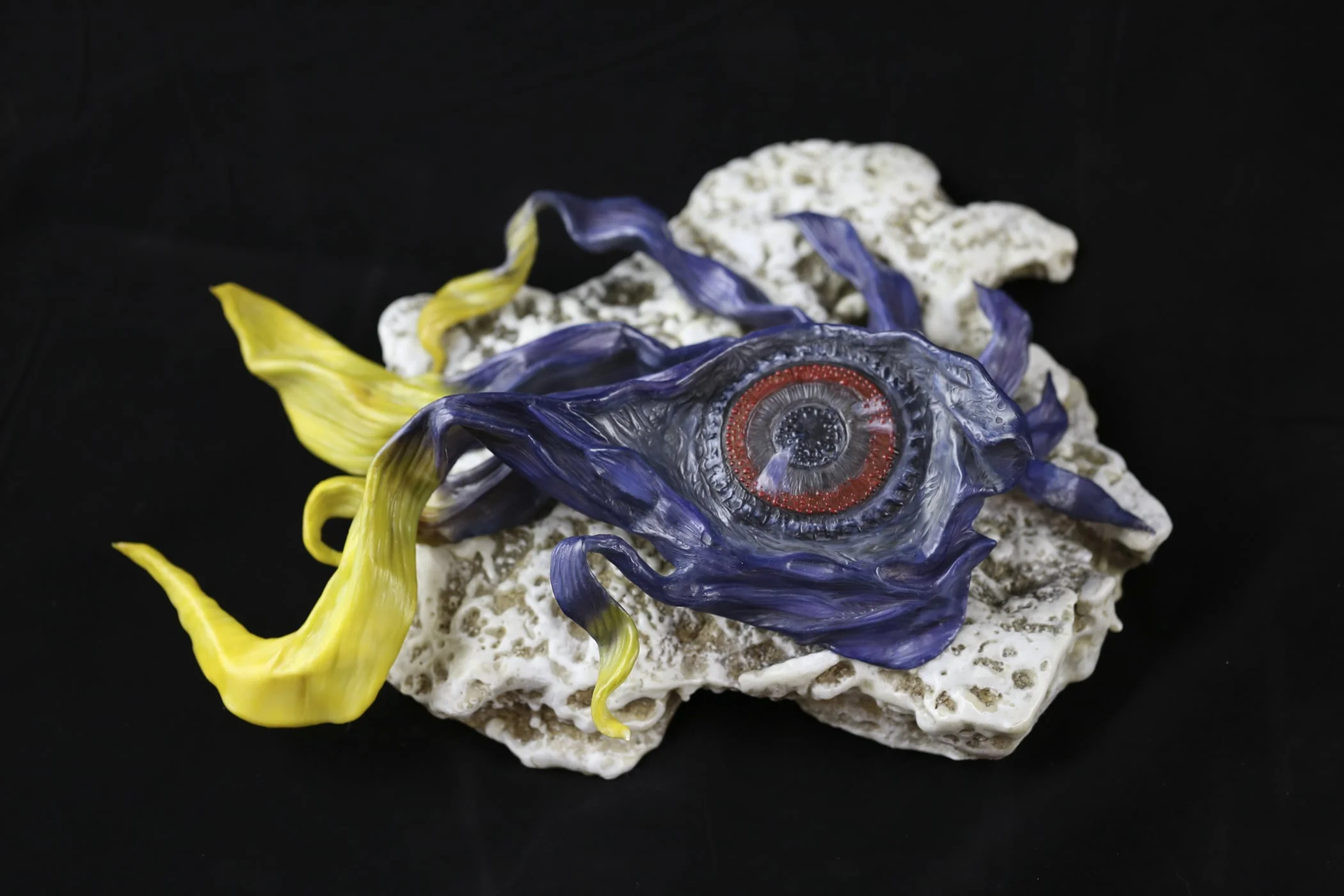 "Dive Deep" (12 x 14 x 5) (Macro photo of a parrot that sat on my lap at the zoo, "transformed" into sea creature... this is a pedestal piece).