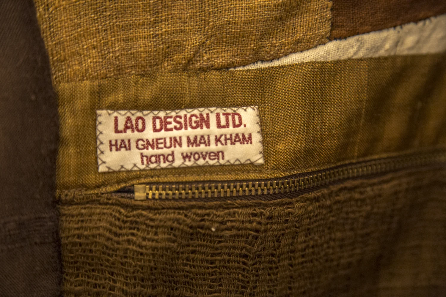 Bounkgohn Signavong's hand-woven jacket (above), detail (shared that it took ten years to weave and construct!)