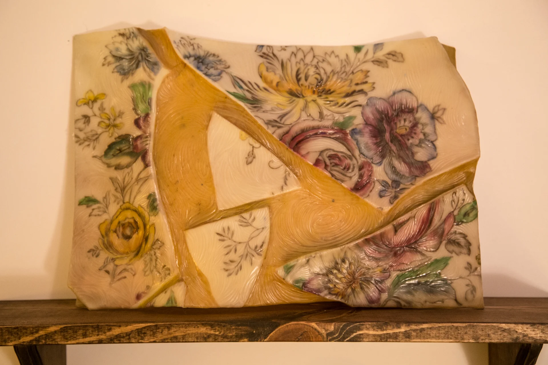 "Her Beauty Still Shone" (Ida Fuss Klee, 1904-1998), 2016,(18 x 24 x 5 inches), (kozo paper, photograph, beeswax, carved and sculpted, hand-colored with powdered pigment and resting on handmade plate rail)