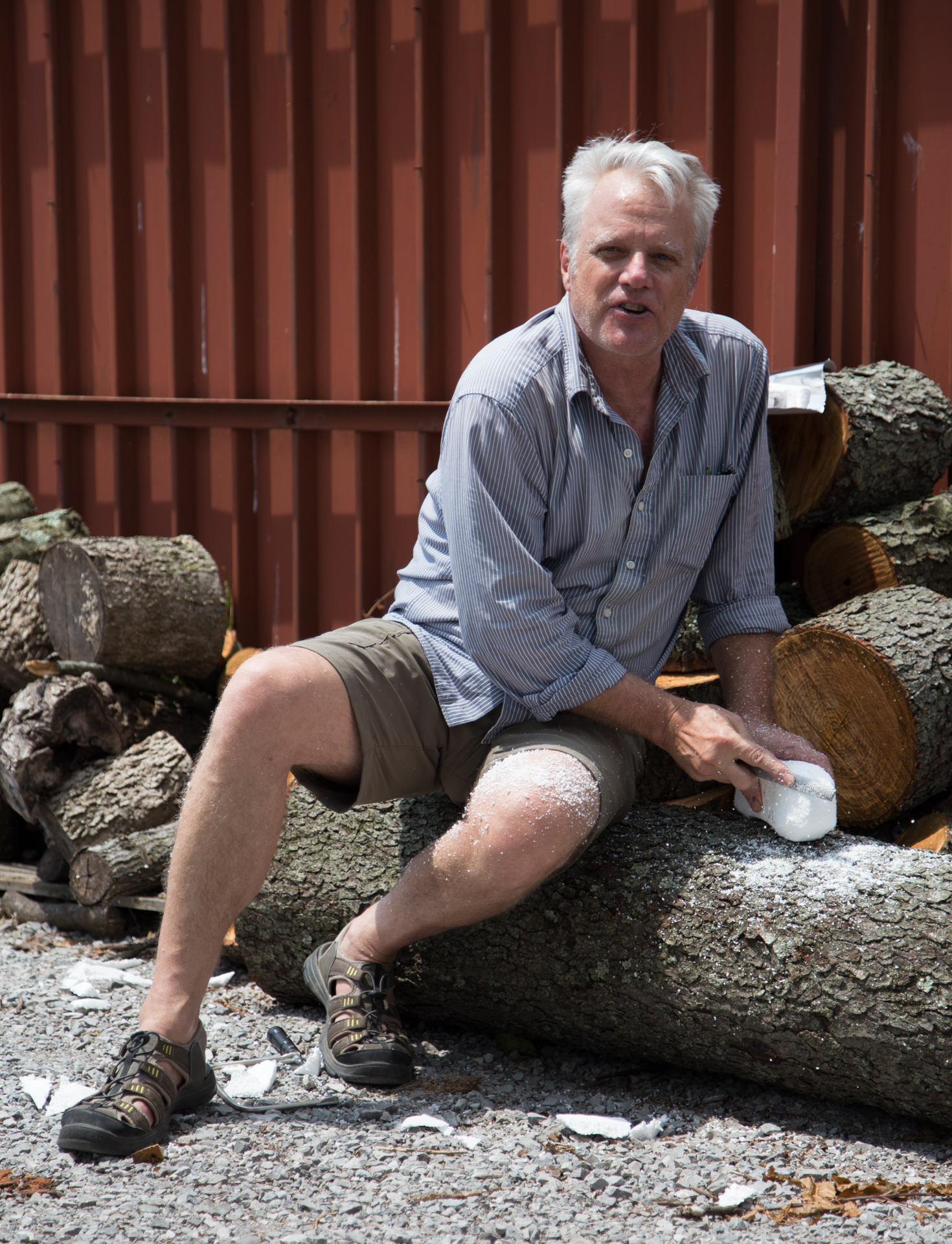 Smiling in this image, Geoffrey was being a good sport as he acclimated to our sweating-buckets-weather, and the sawdust was quite uncomfortable!