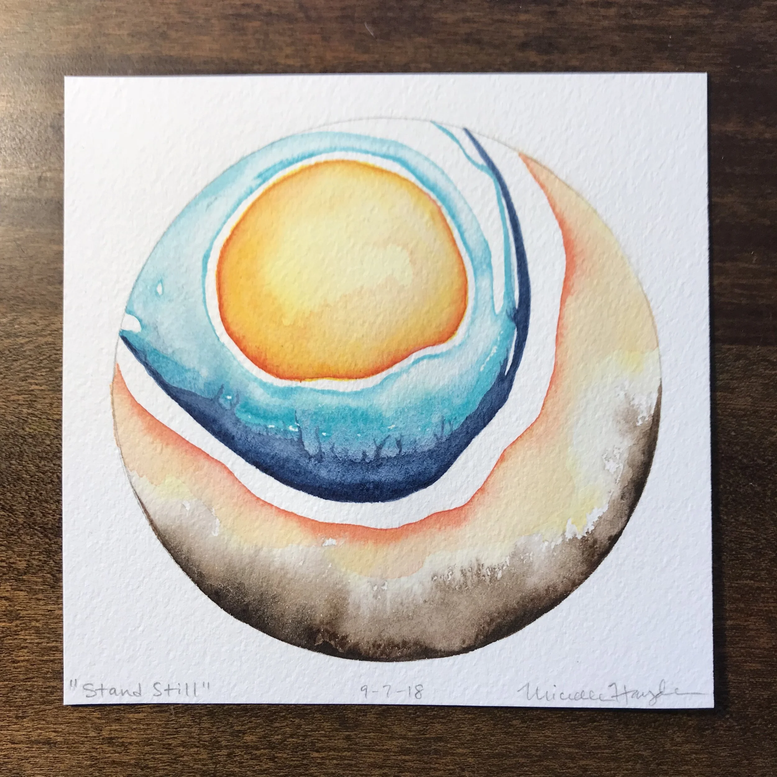 ("As the paint took form on paper, I connected to the soothing that comes from creating what I want to see and feel, rather than what is in front of me. Today will be spent mostly indoors, yet I know that it is the grounding into the earth and sky that I am craving. When the title came, I appreciated its double meaning... that we can all stand still and ground, and that we can stand, still...")
