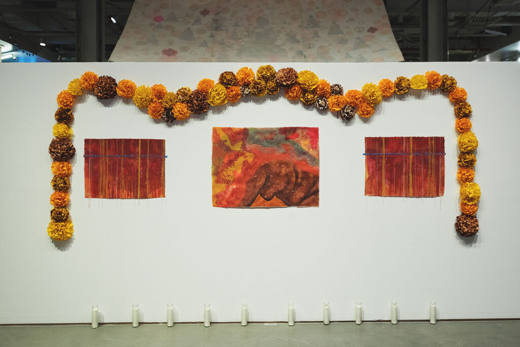   Candy Alexandra González ,  Altar to corporal striations  (Installation), 2019, Linen pulp paint on abaca base sheet, measuring tape, handmade paper flowers, candles, Dimensions variable 