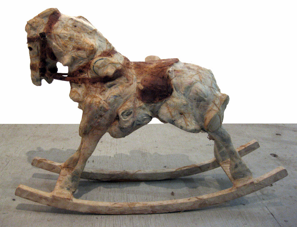   Shawne Major   3 Legged Race , 1997 Handmade abaca and mixed media including toys and baby shoes. 26 x 17 x 16 inches, 