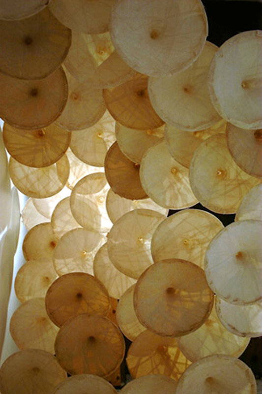   Wennie Huang   Between Heave and Earth (view from below) , 2003 Cast abaca paper with methyl cellulose 14 1/2 x 14 1/2 x 7 Inches (inside rim; each hat) 