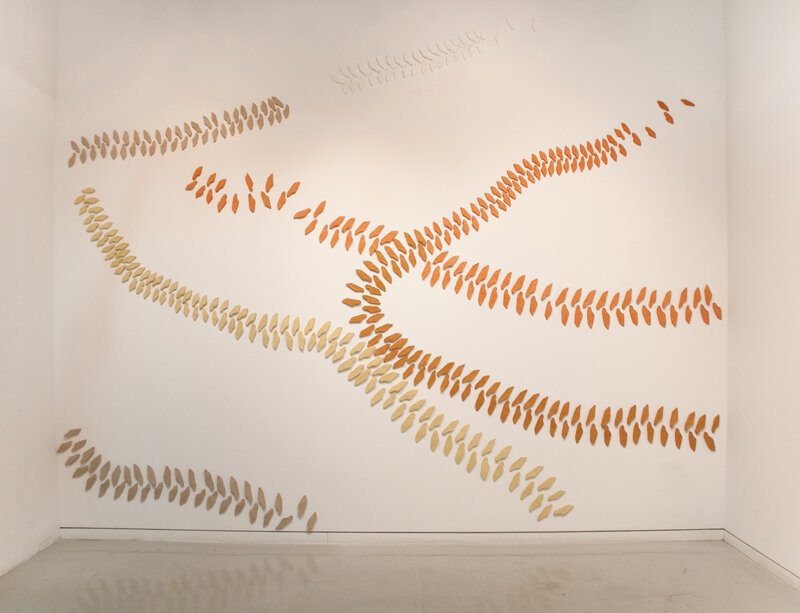   Shirley Wegner   Tractor Traces , 2009 cast cotton handmade paper installed on Dieu Donné gallery wall dimensions variable 