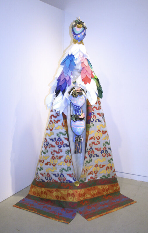  Saya Woolfalk   Empathetic Morphology: Herniated Consciousness (two-ness) , 2012 handmade linen and abaca paper, synthetic fabric and felt, plastic bones, mannequin, glass and plastic beads, feathers, epoxy, and styro-foam heads 82 x 28 x 21 inches
