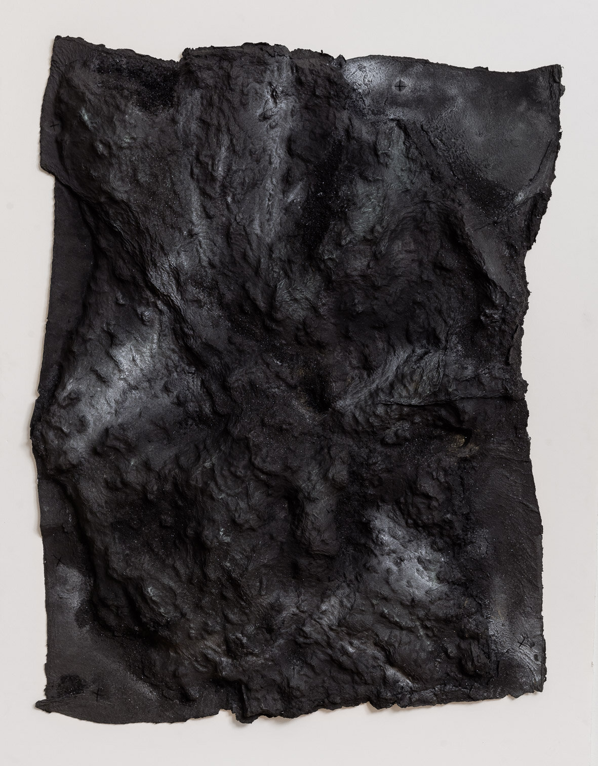   Blane De St. Croix   Lava Bed, Kilauea 2 , 2015. Paper and metal powders. 40 x 32 x 3 inches. Image credit: Etienne Frossard. 