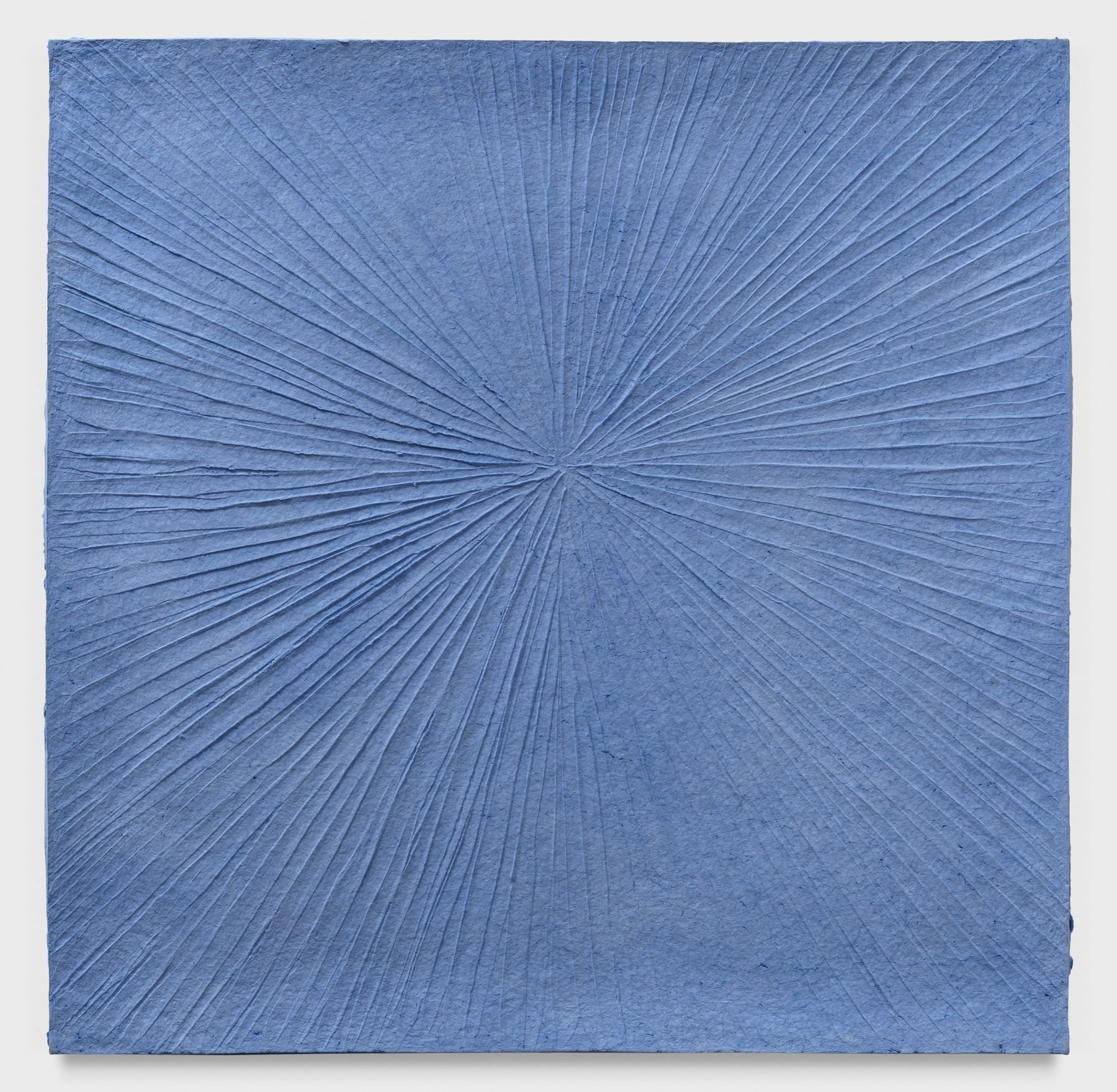   Blue Starburst,  2023, 30h x 30w x 1d in Cast pigmented paper pulp. 
