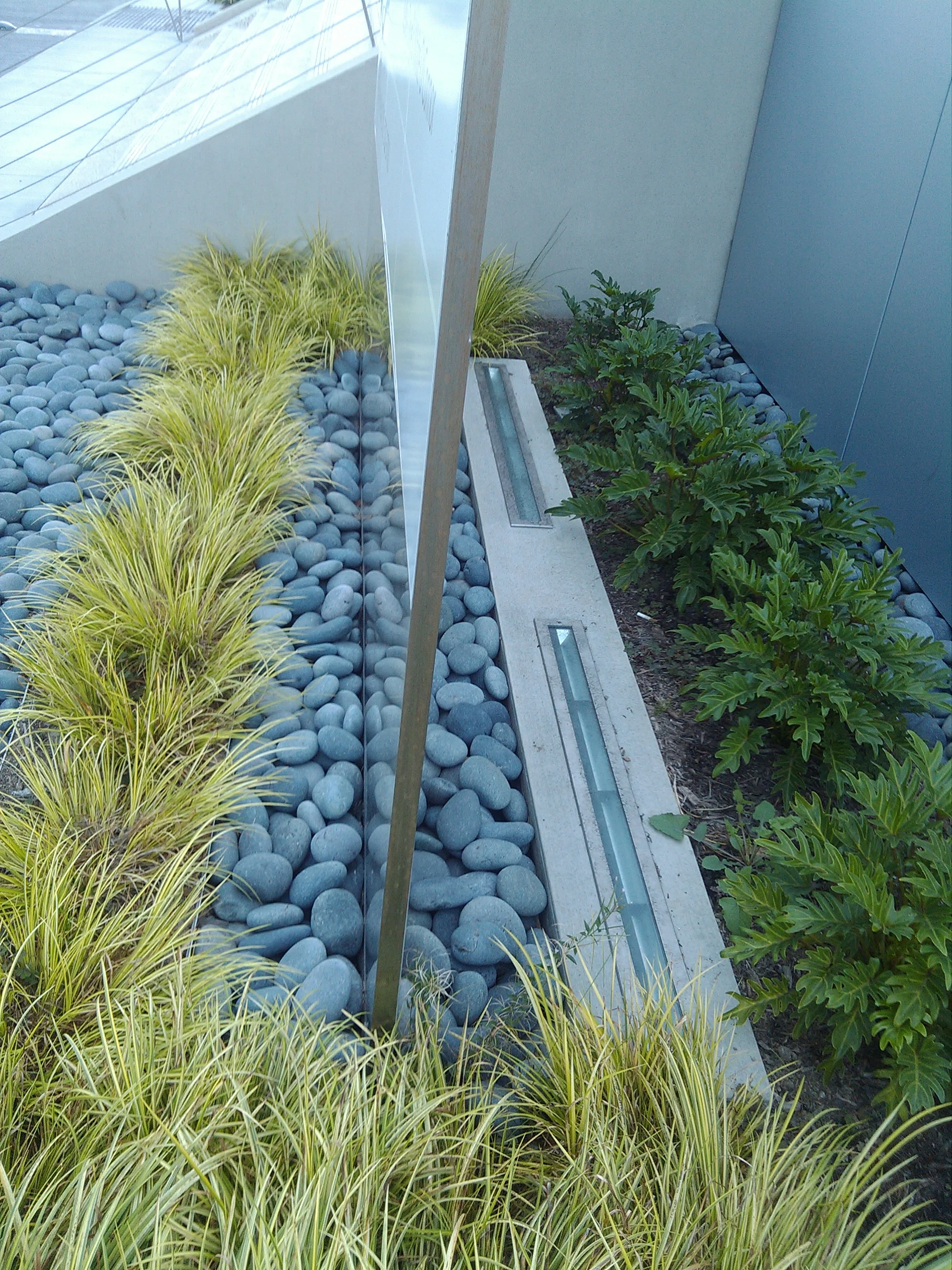 Brushed stainless steel returns applied to sides of glass for a refined finish.