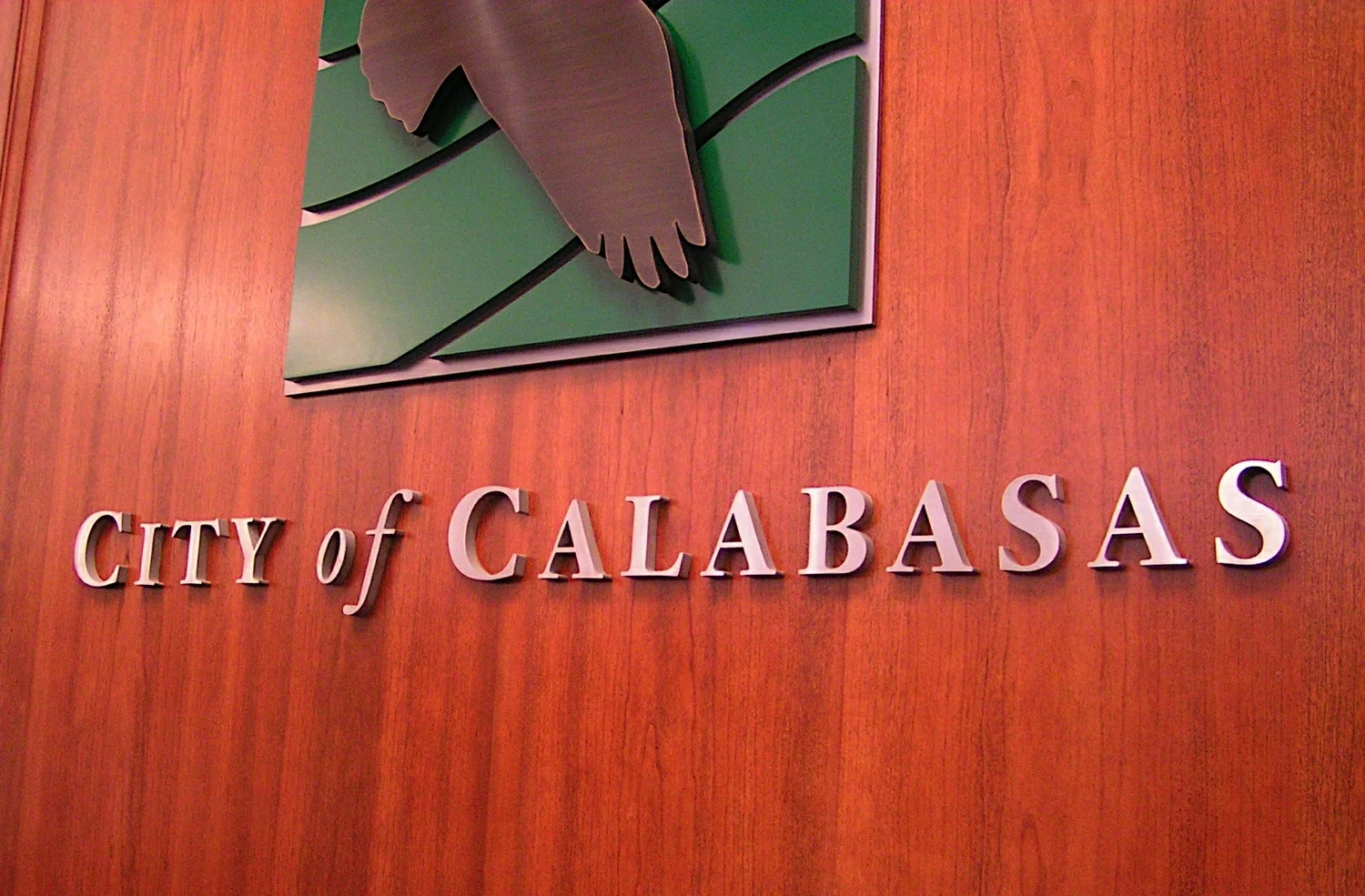  ...painted aluminum background sections, cut-out aluminum lettering with brushed finish. 