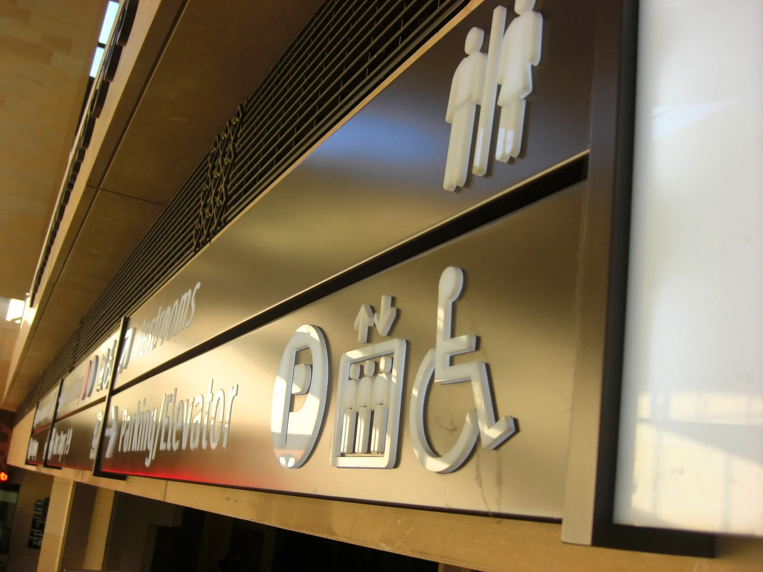  ...laser-cut aluminum changeable message panels with push-thru acrylic graphics... 