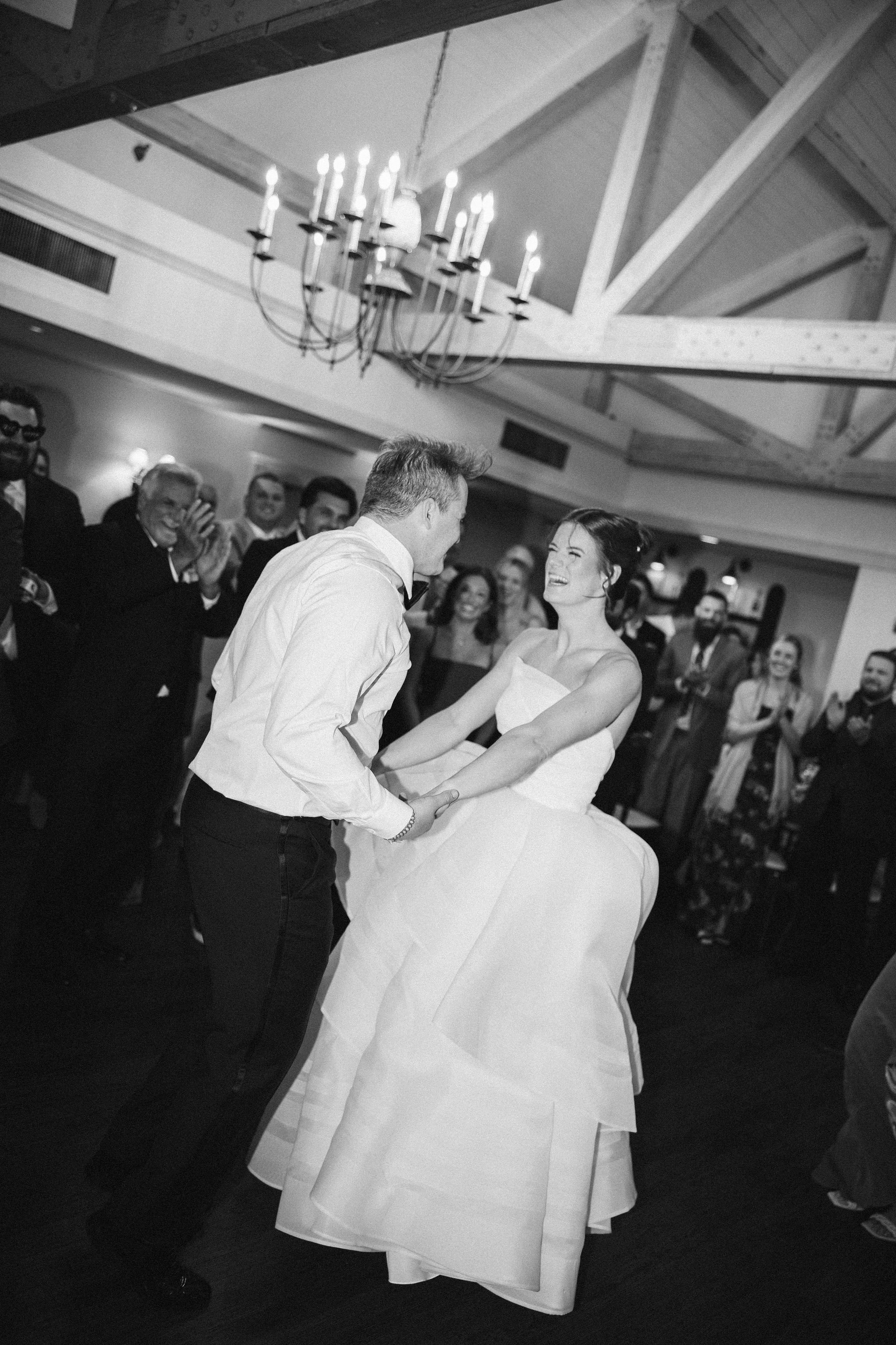bride and groom dancing at the center of the dance floor