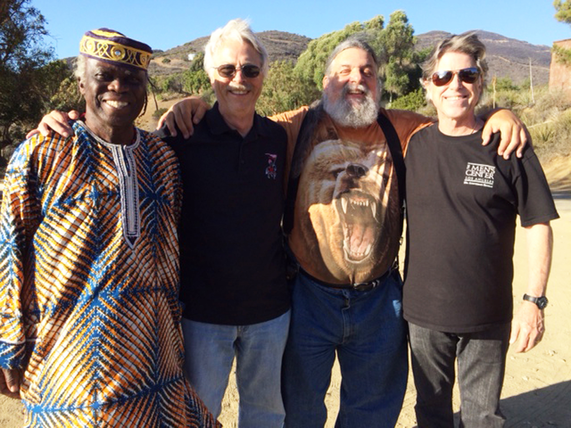 MEN ON THE MOUNTAIN: (left to right) Ayo Adeyemi, Steve Branker, David "StrongBear" Myers and Dr. Stephen Johnson