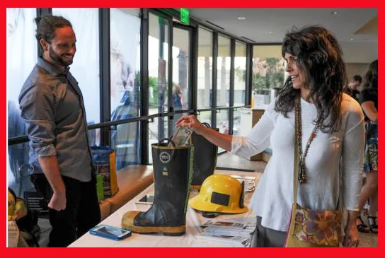 Attendee Louise Fontana donates to Firefighters Down on Sept. 11 during the nonprofit’s premiere benefit concert at Smothers Theater in Malibu . . . (Photo by Suzy Demeter/22nd Century Media)