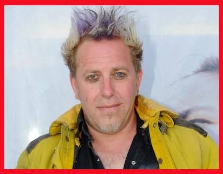 A Flock of Seagulls drummer Kevin Rankin dons firefighter gear at the event . . . (Photo by Suzy Demeter/22nd Century Media)