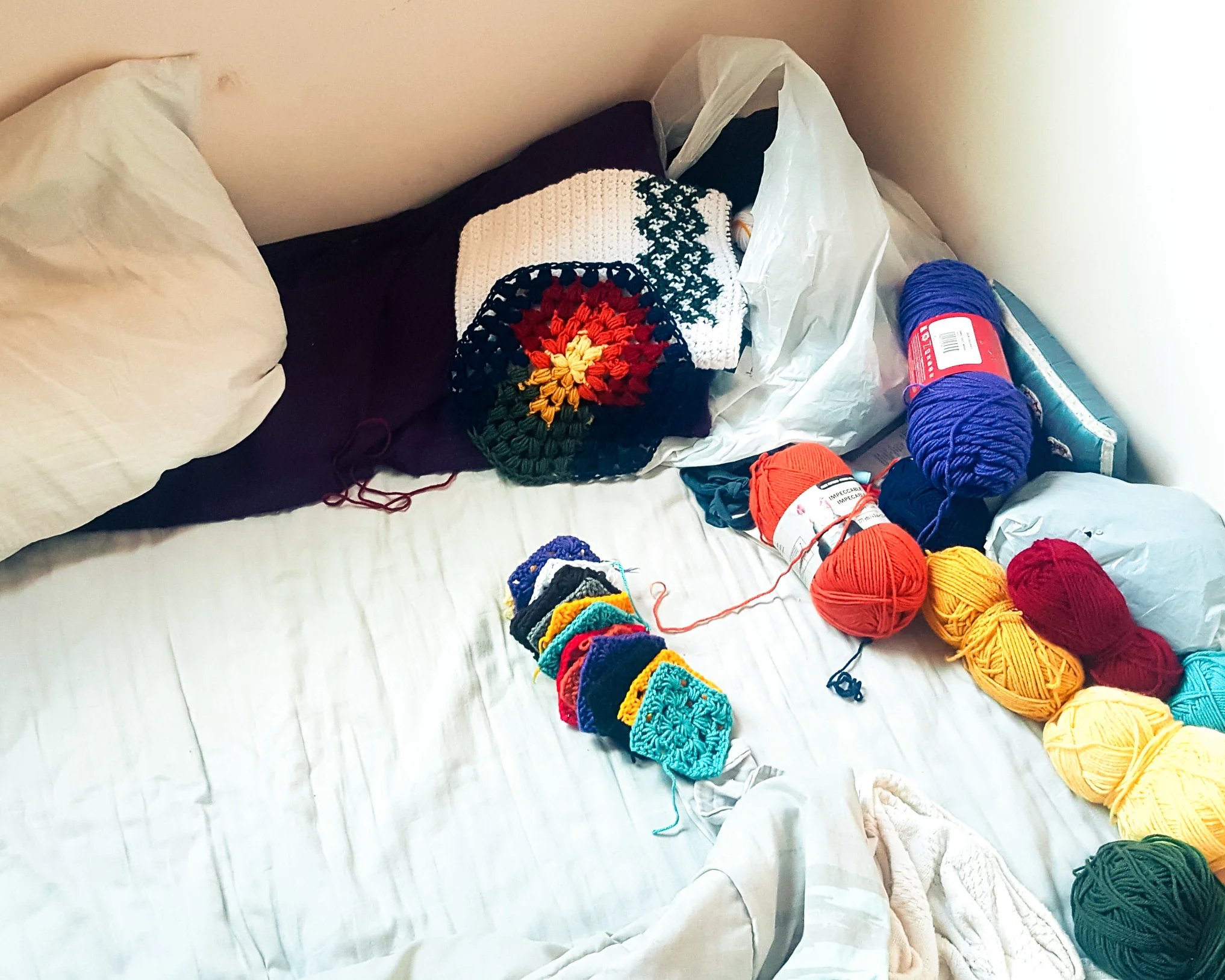 an actual image of the crocheting corner of my bed