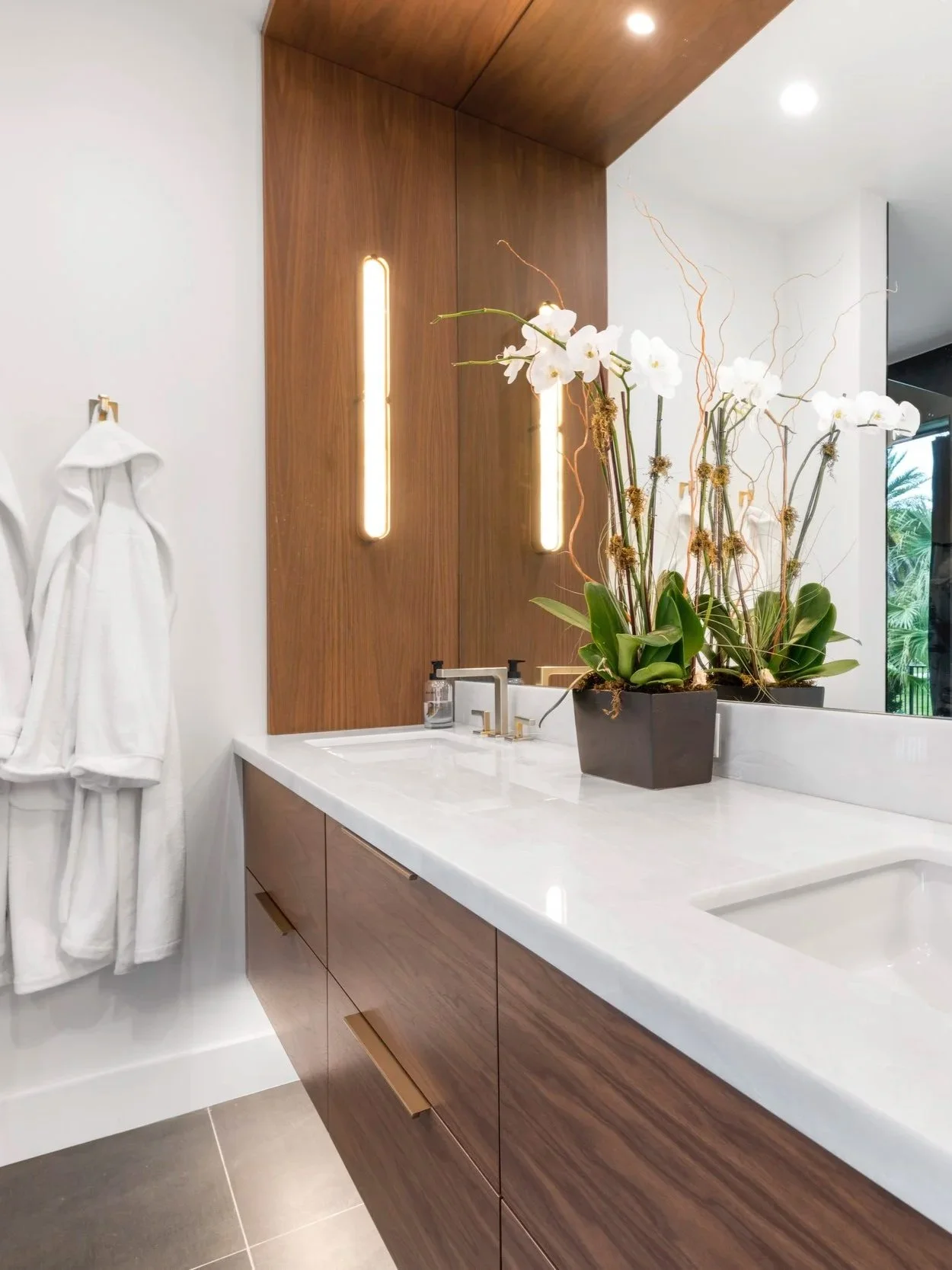 refined residential bathroom with custom cabinetry
