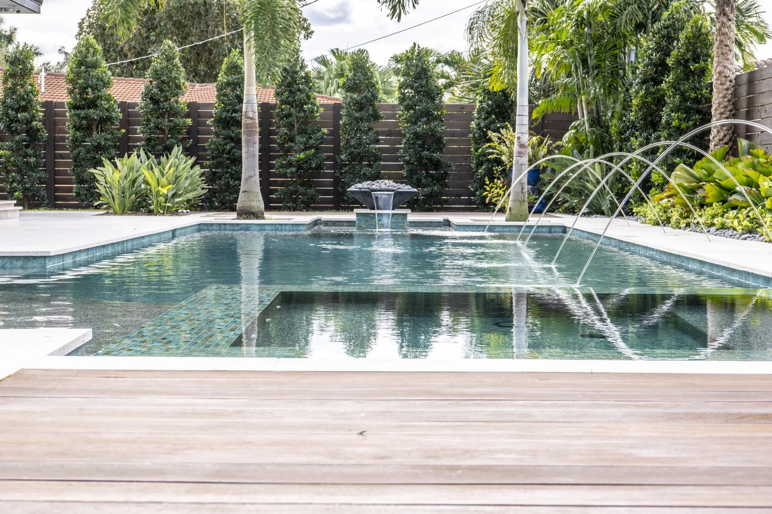 Luxury Residence Back Yard with Swimming Pool built of High end materials and Pebble Tec