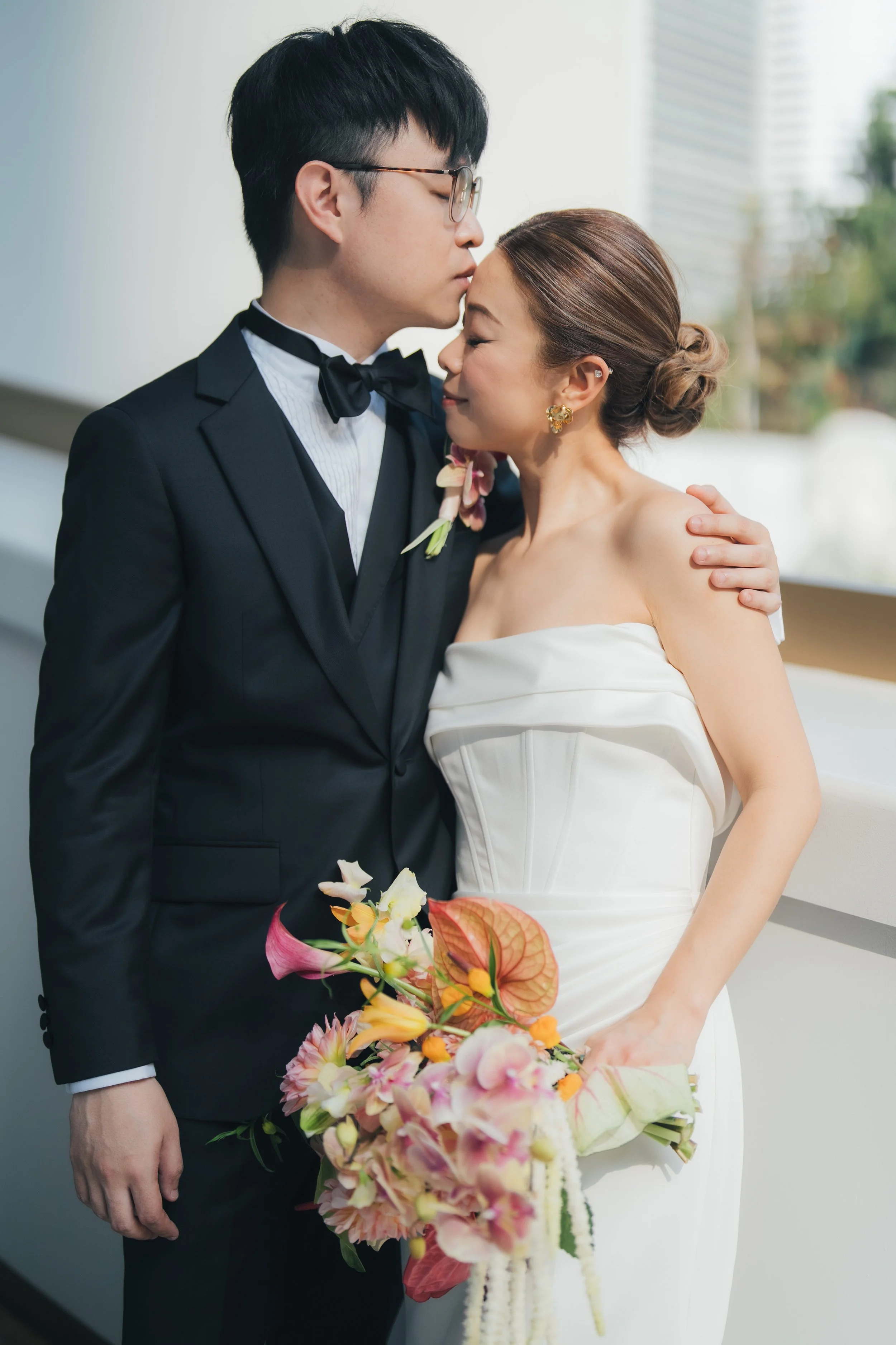 Phoebe and Jacky share a quiet wedding portrait before heading to The Peak Lookout, Hong Kong.