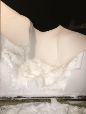 This is what it looked like when we opened the door to the backyard. The snow was 3-4 feet high.
