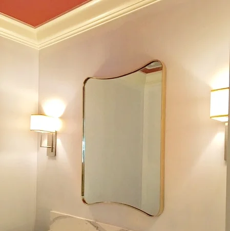 "I also really love this free form mirror we did for a Hillsborough project." -Taylor