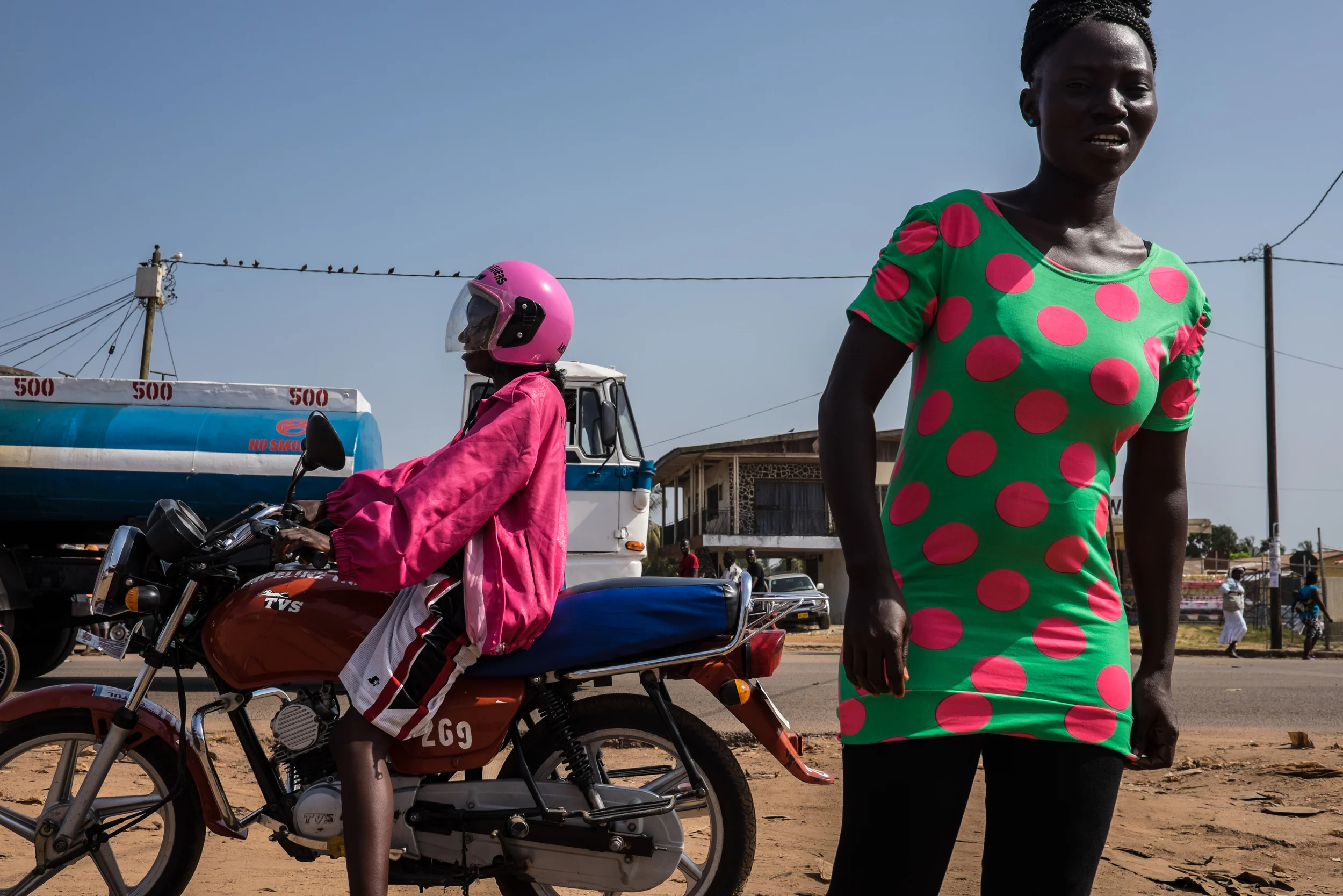 One of the challenges the Pink Panthers faced was other females were often hesitant to hire them as taxi drivers, and some men who rode made unwanted sexual advances. Together they are working to combat these issues. Monrovia, Liberia, February 19, 2015.