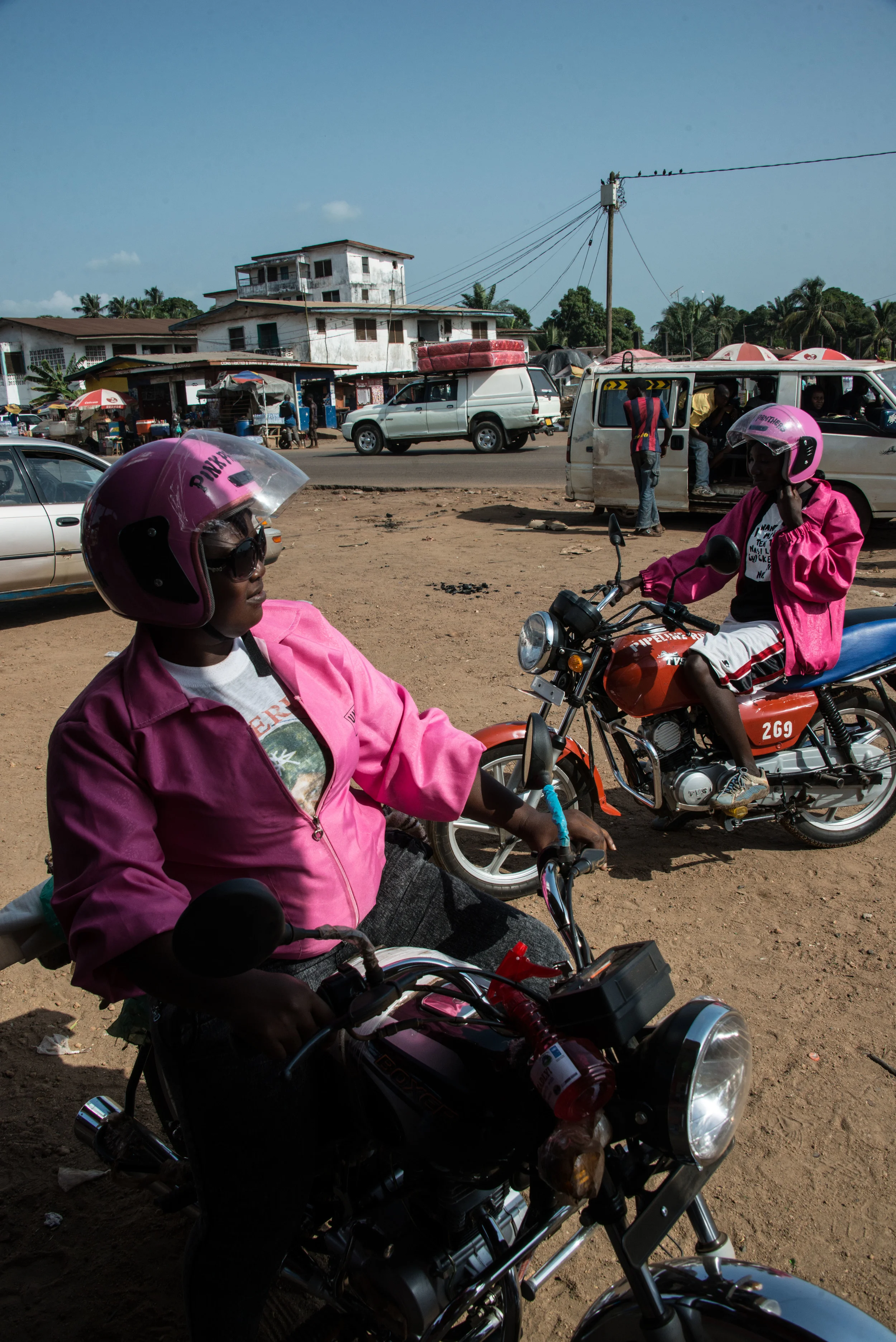 One of the challenges the Pink Panthers faced was other females were often hesitant to hire them as taxi drivers, and some men who rode made unwanted sexual advances. Together they are working to combat these issues. Monrovia, Liberia, February 19, 2015.