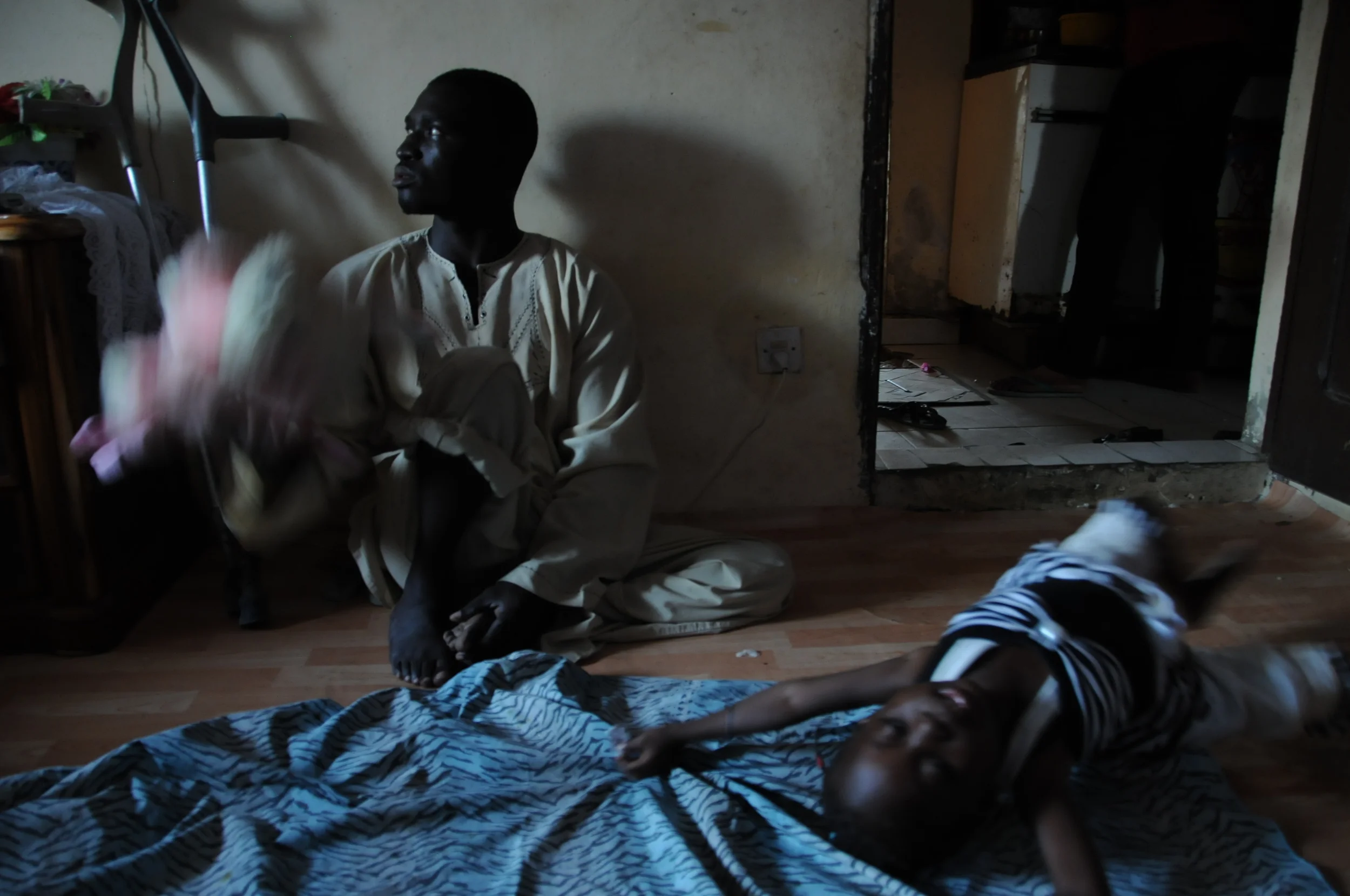  Every night Faye comes home to eat dinner with his wife, who is also handicapped, and their four-year-old daughter Bintu. He often watches old video of his team’s games. He, along with some of the younger players, dream of playing handicapped basket