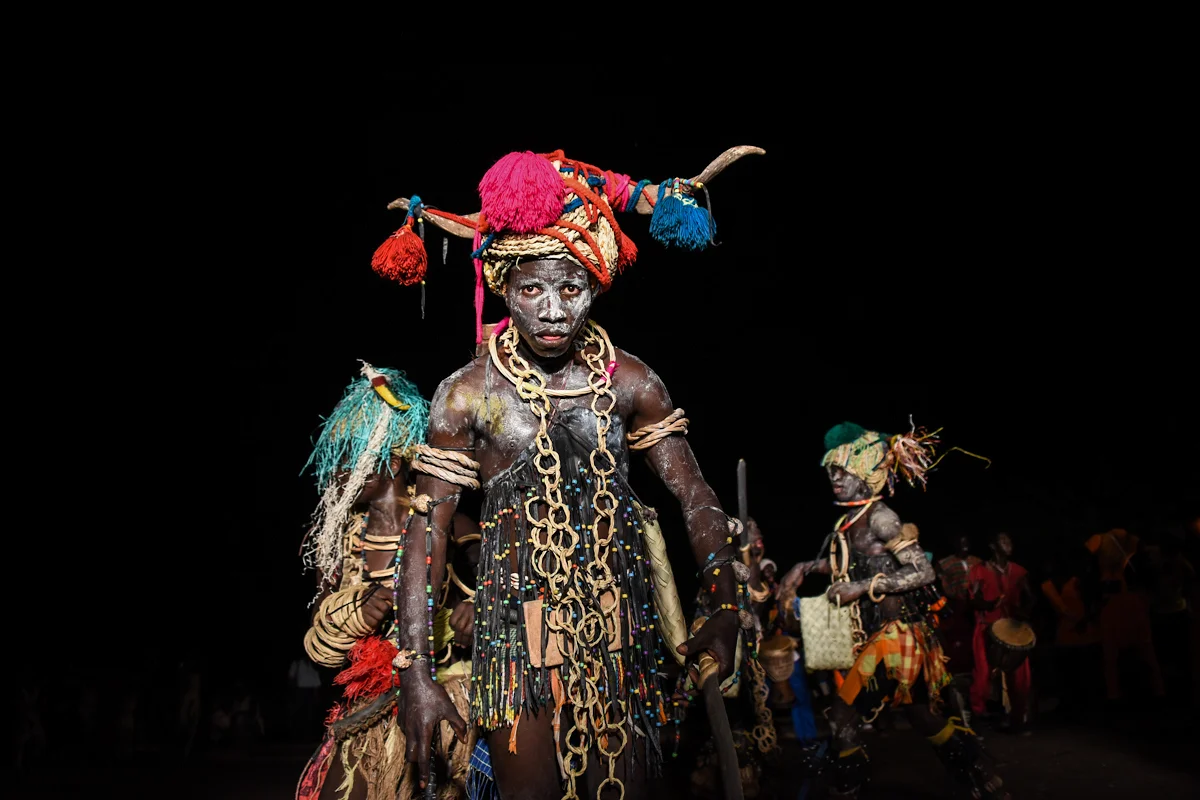 Bissau, Guinea-Bissau (February 6, 2016) - A group performs a dance from the Bijagos ethnic group in Bissau, as they compete in Carnaval competitions in Bissau, Guinea Bissau. The theme of this year's Carnaval in Bissau, which runs from February 6-9, is "Rescue and Promote Our Culture." As part of those festivities, teams from all over the West African country compete by dressing in ceremonial clothing and perform dances from a variety of the country's ethnic groups, such as the Bijagos, here. Every group presents dances and small presentations from many different ethnic groups.
