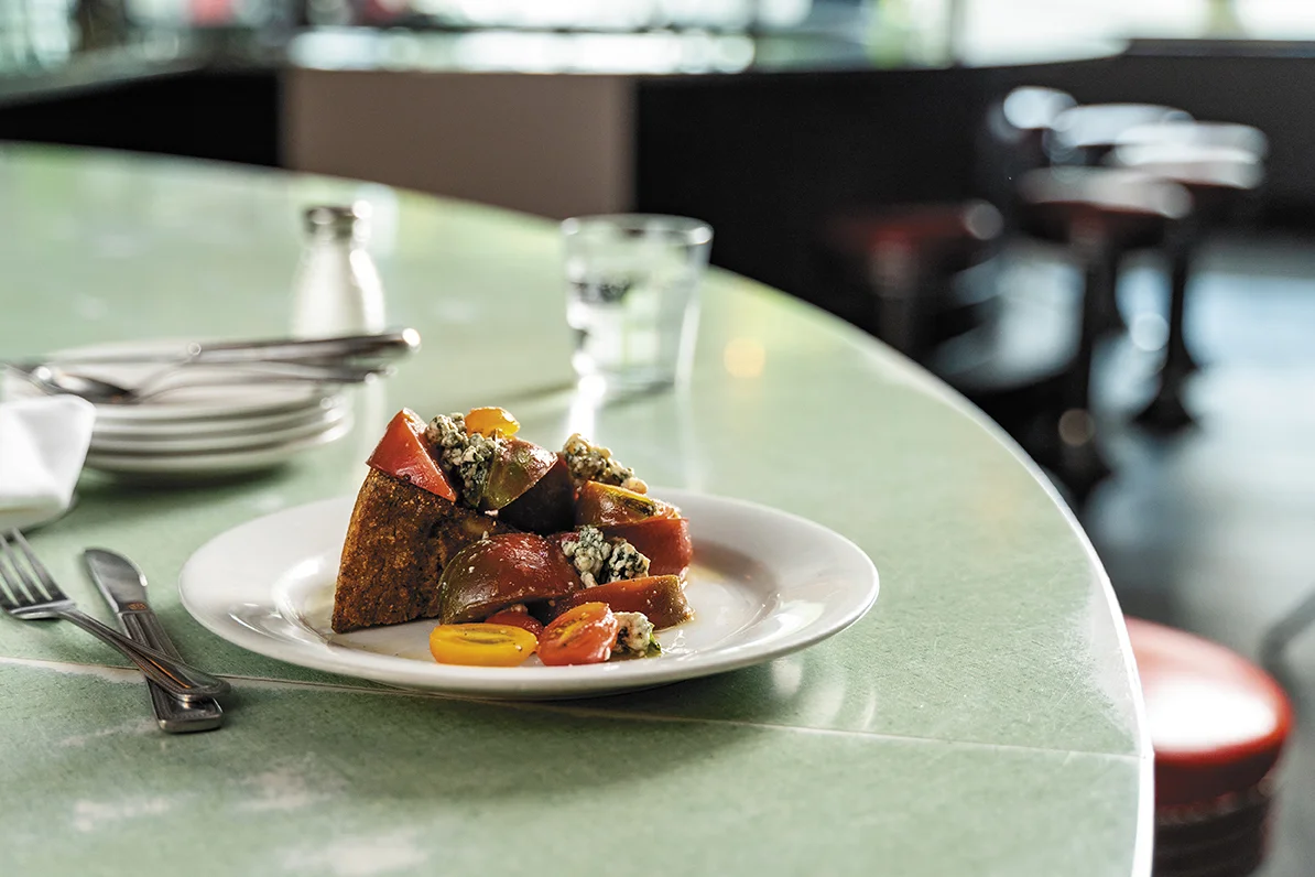 heirloom tomatoes with grilled cornbread, butter milk bleu cheese, and white balsamic thyme vinaigrette