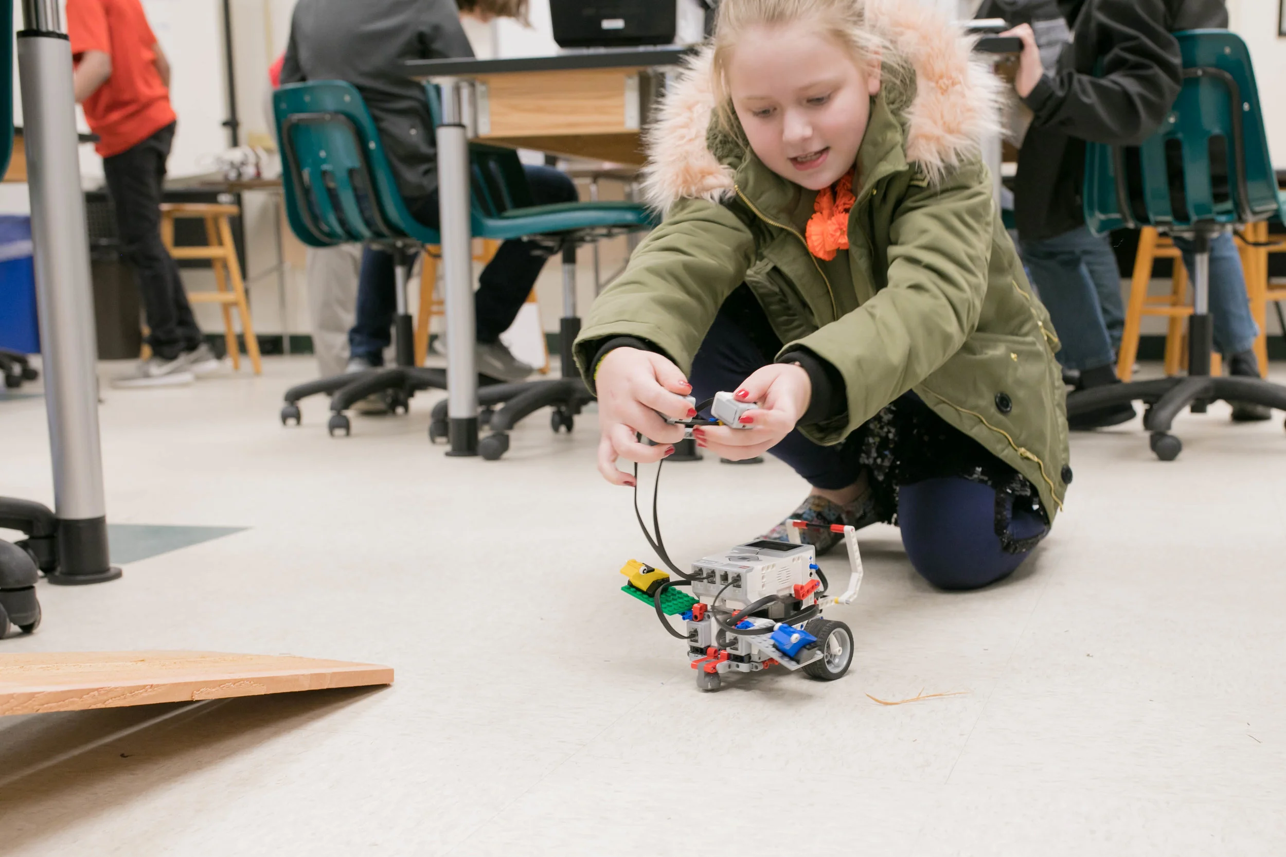 ravenscroft school students work with lego robotics in the school’s middle school engineering class. Photo by Laura B. Hunter Photography