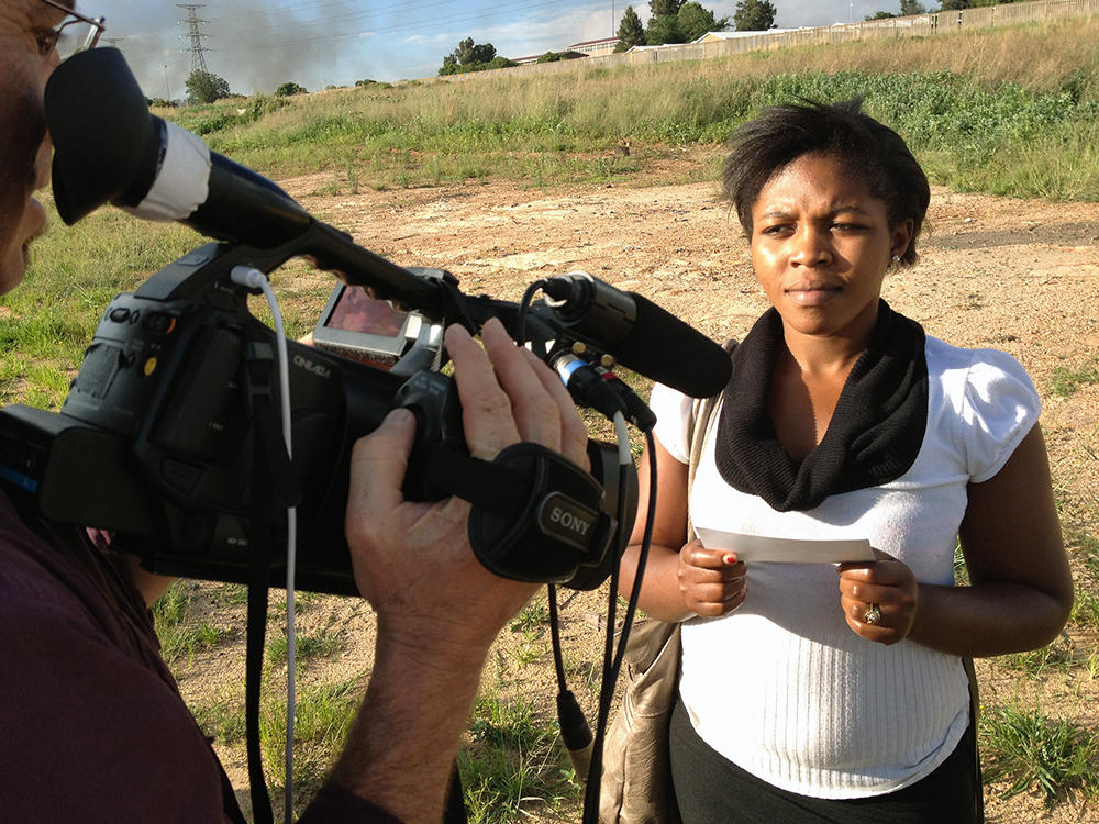 A young woman being interviewed in Soweto