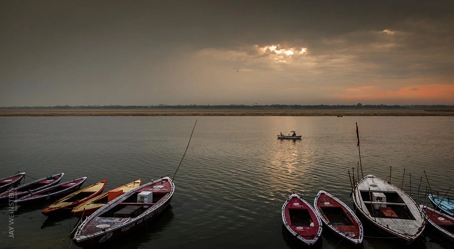 The sun rises over the Ganges River in Varanasi, Uttar Pradesh.