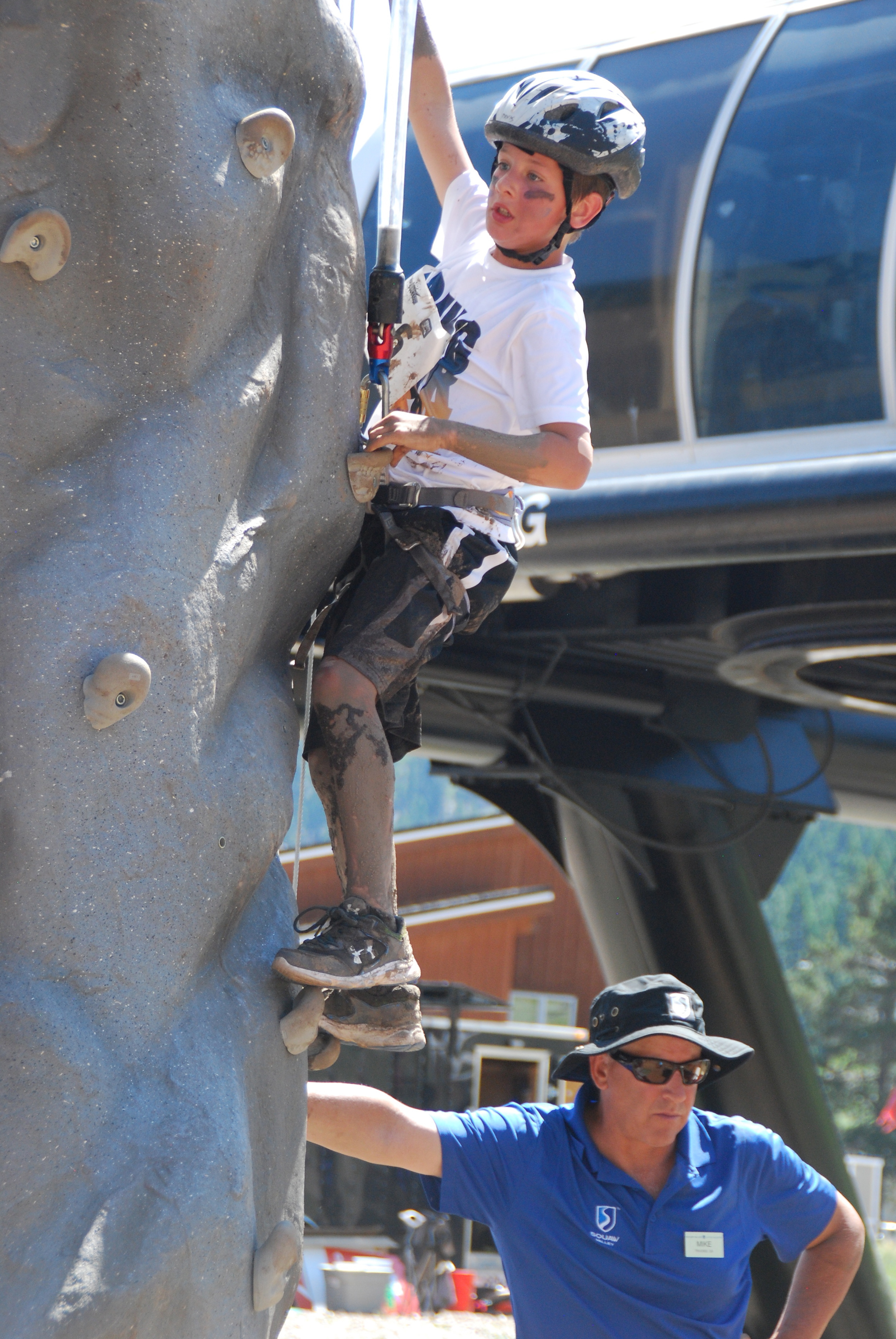 One BGCNLT participant tackles the challenge of the rock climbing wall