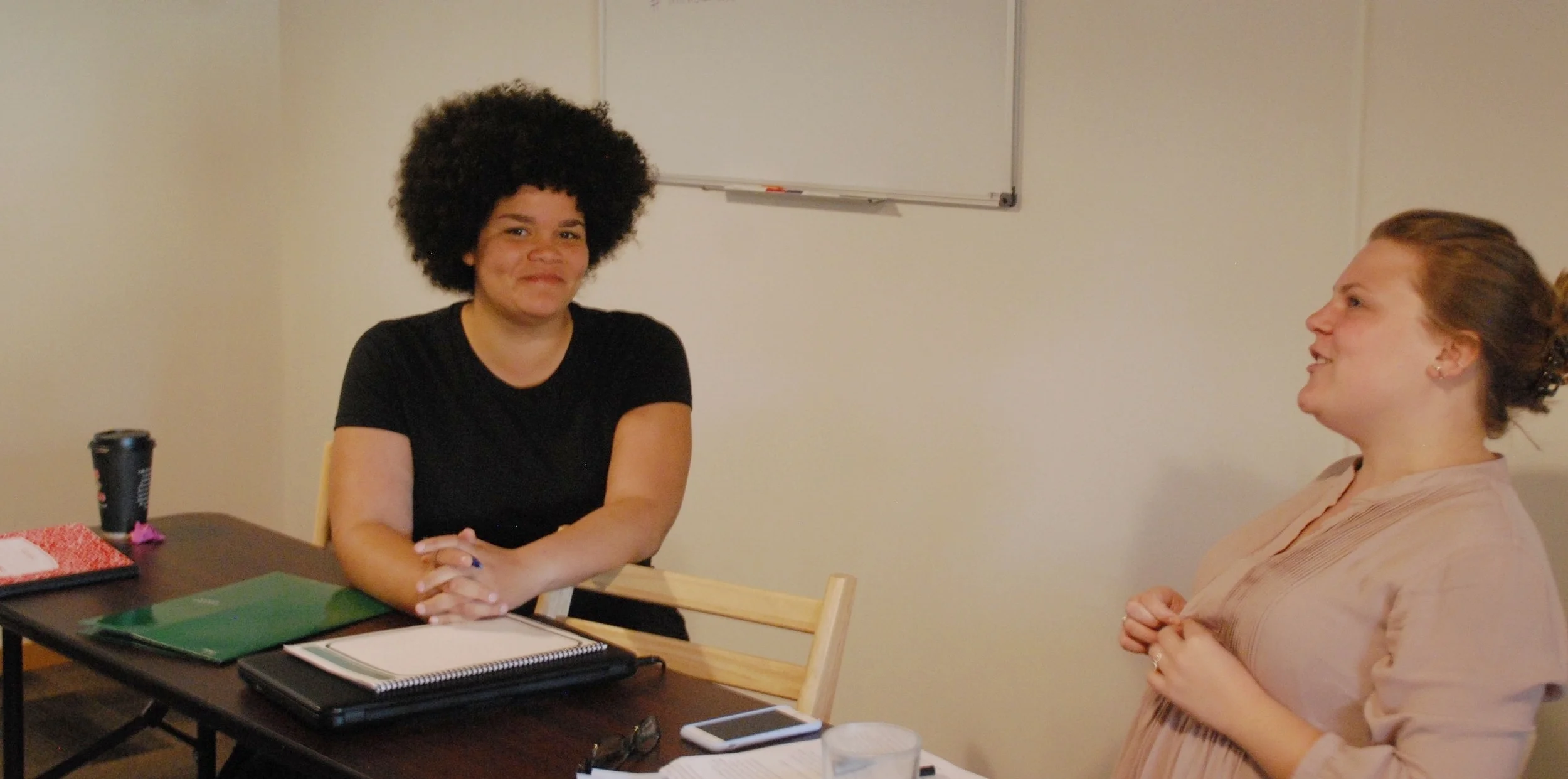Previous fellows, Tara and Emma, connecting at our Fall 2016 retreat.