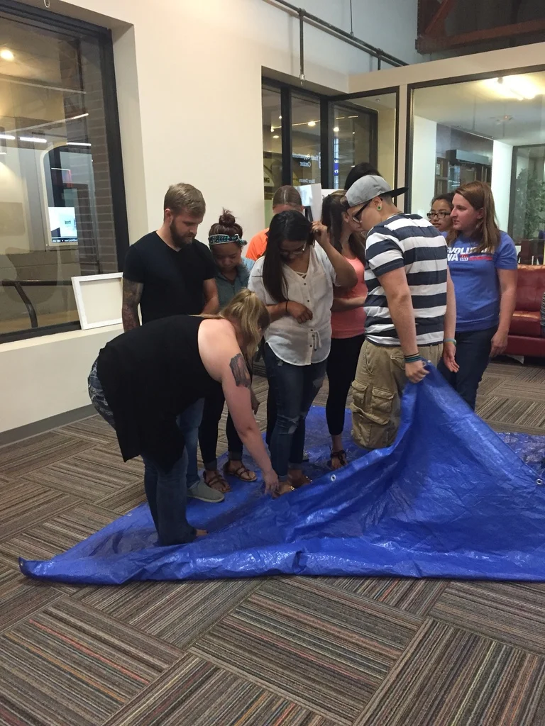Participants doing a team-building activity at PSERP workshop