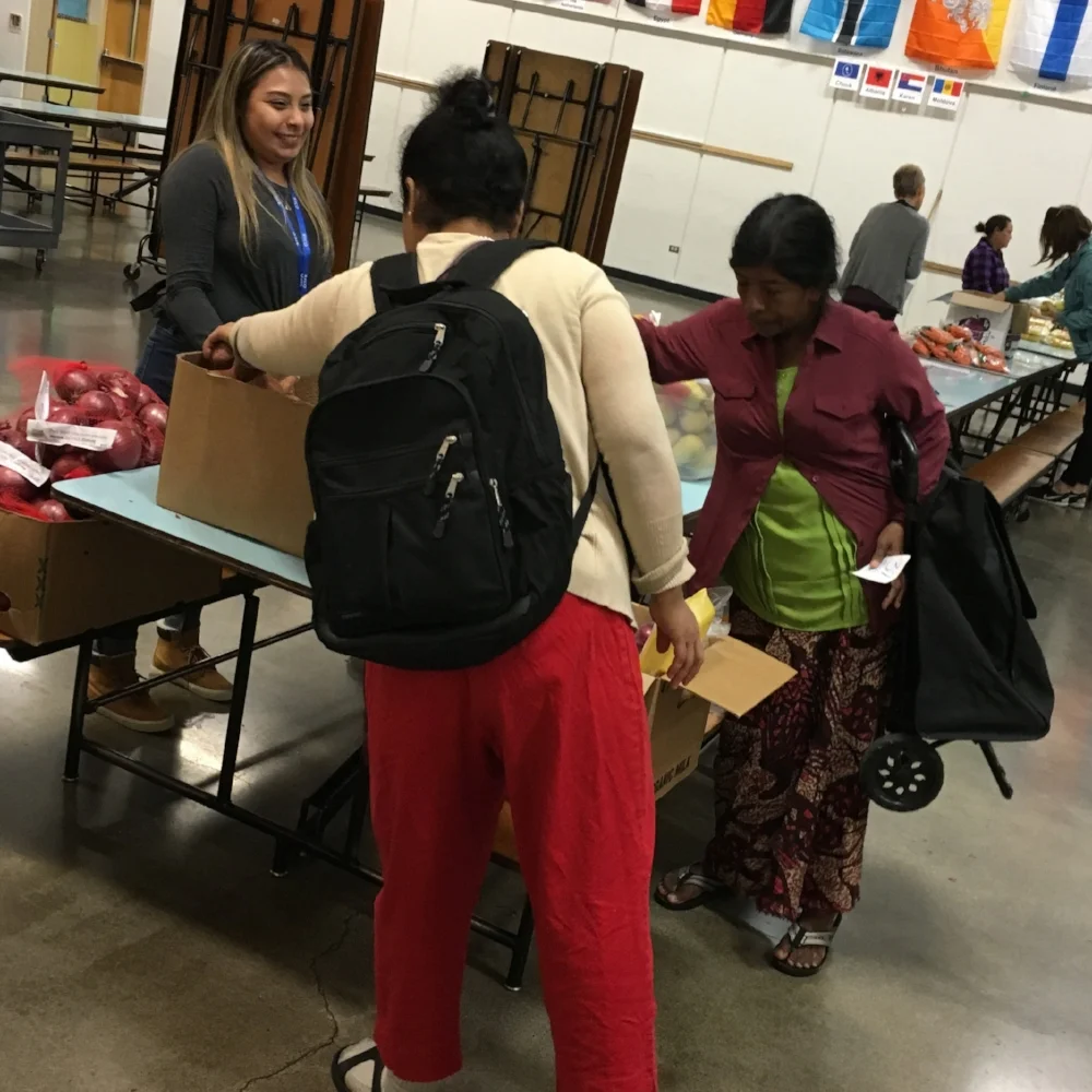 Paola during a visit to a food pantry.